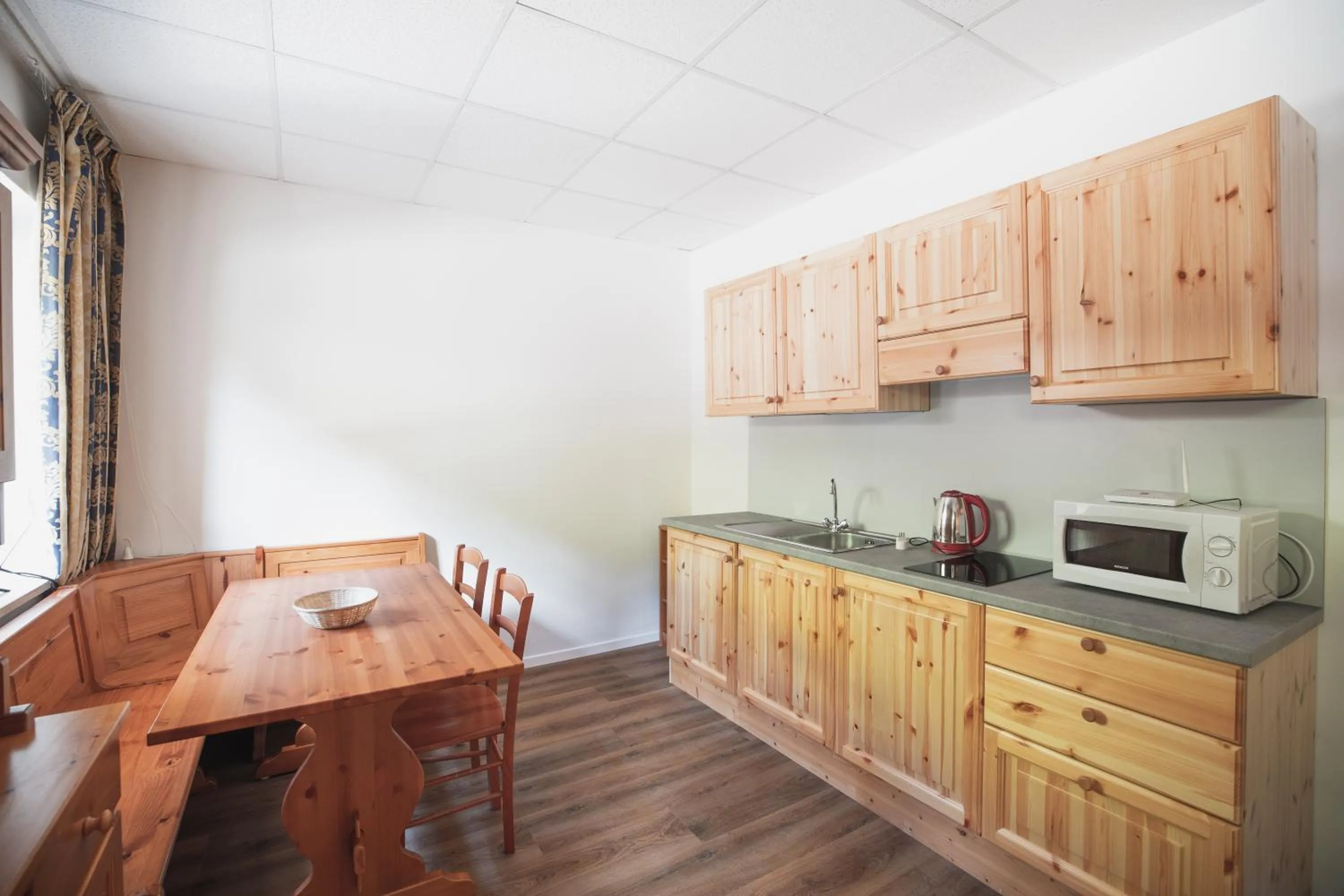 Kitchen or kitchenette in PLOSE Parkhotel & Residence