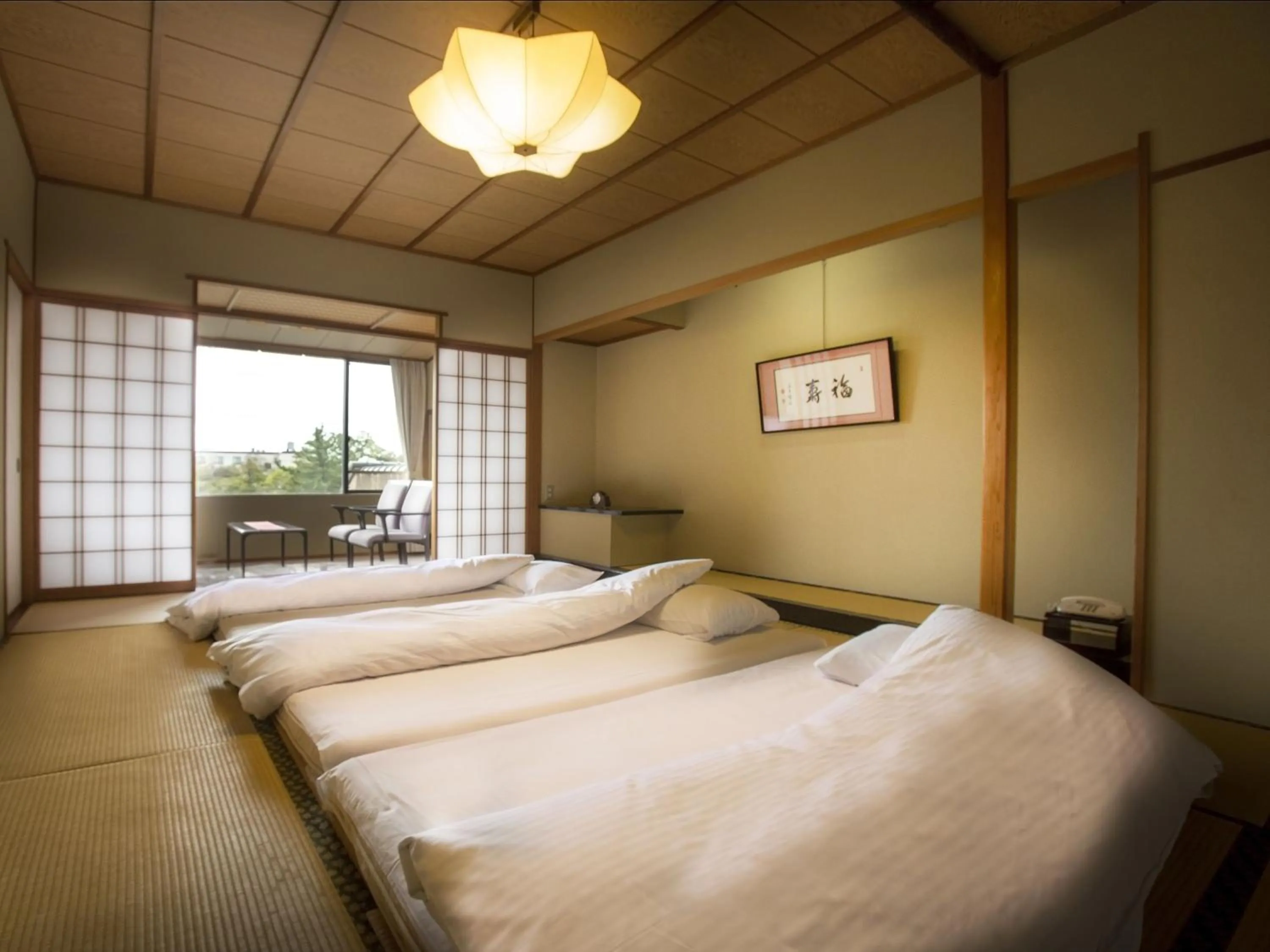 Photo of the whole room, Bed in Awara No Yado Yagi