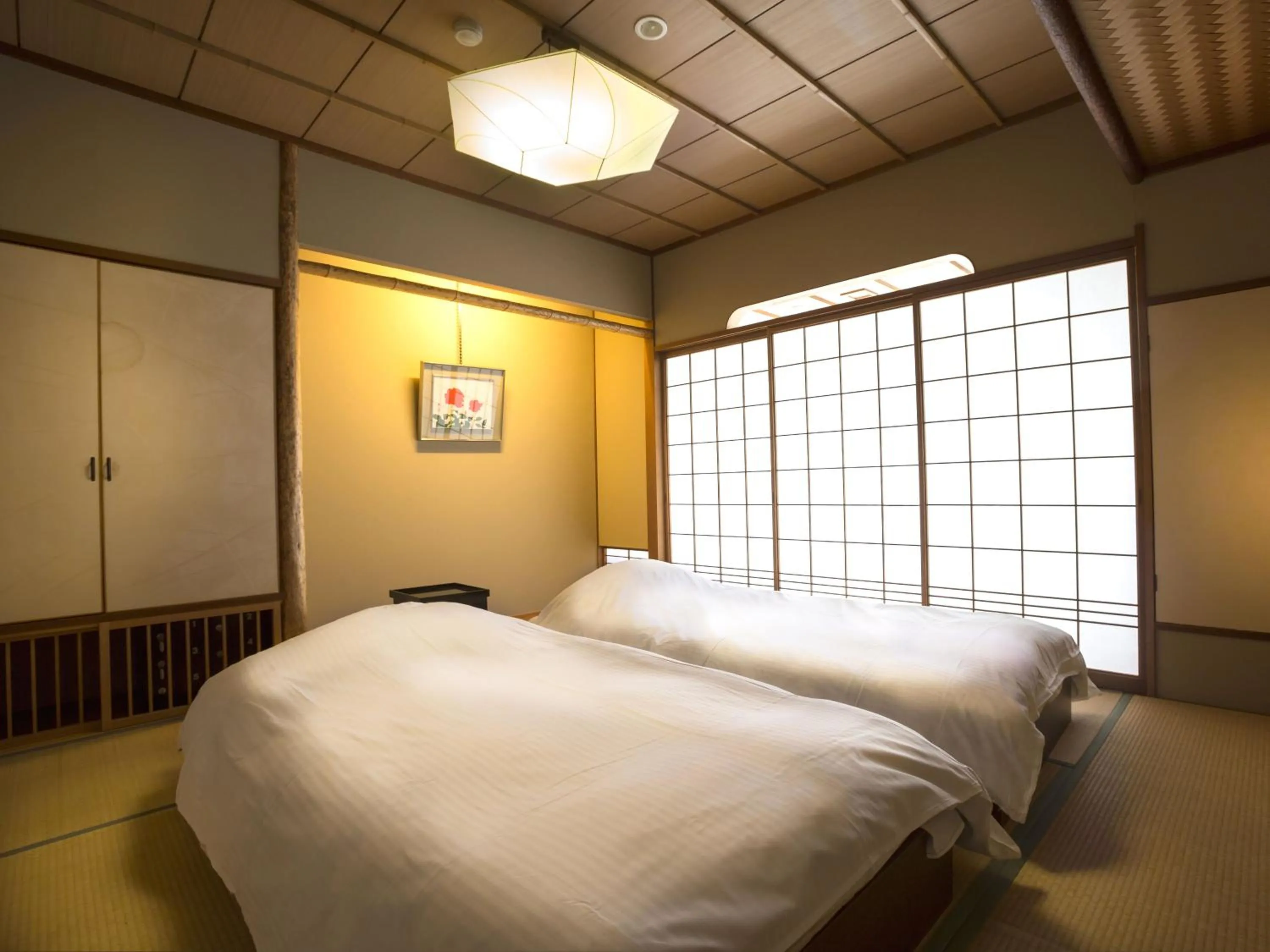 Photo of the whole room, Bed in Awara No Yado Yagi