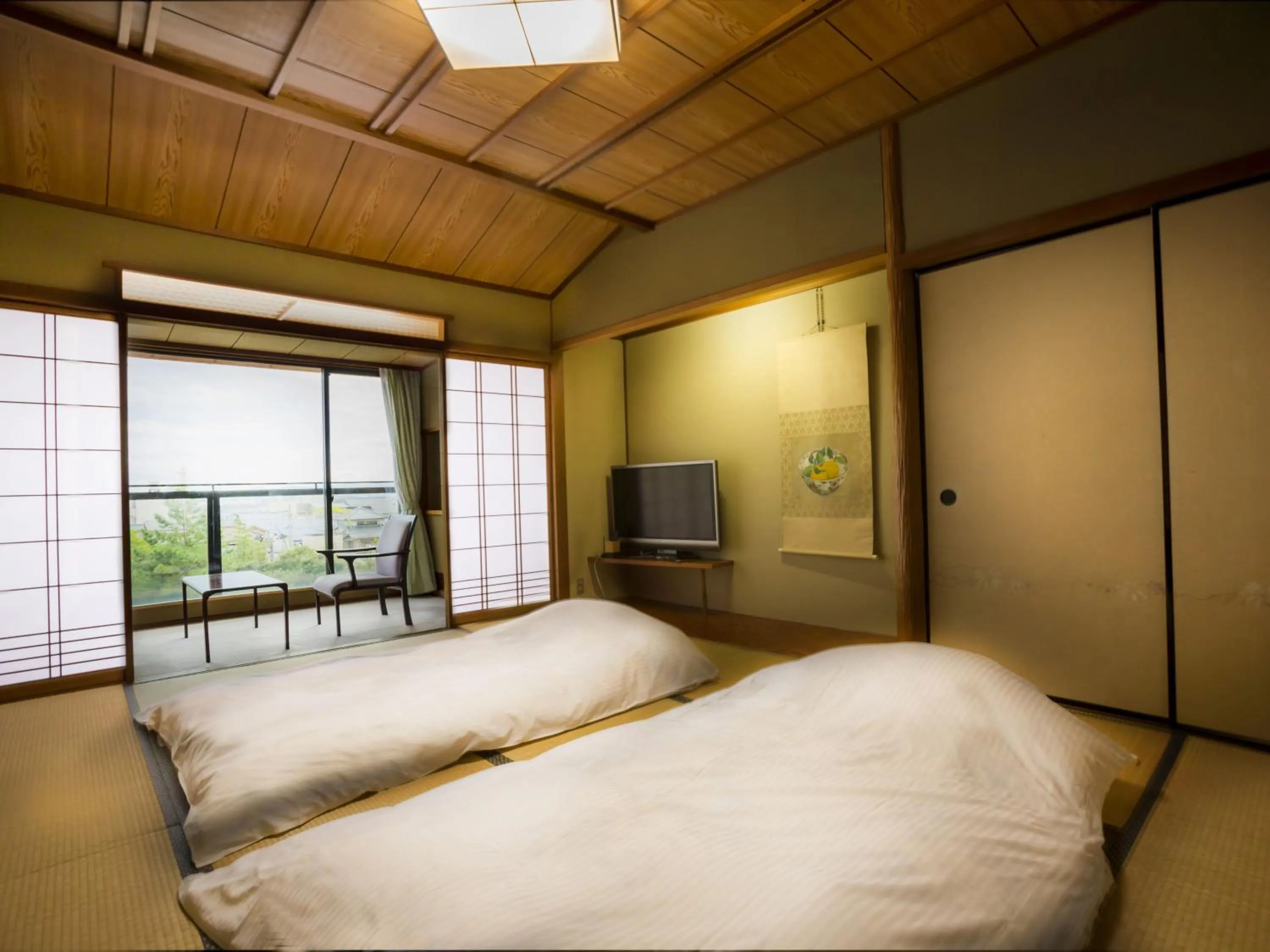 Photo of the whole room, Bed in Awara No Yado Yagi