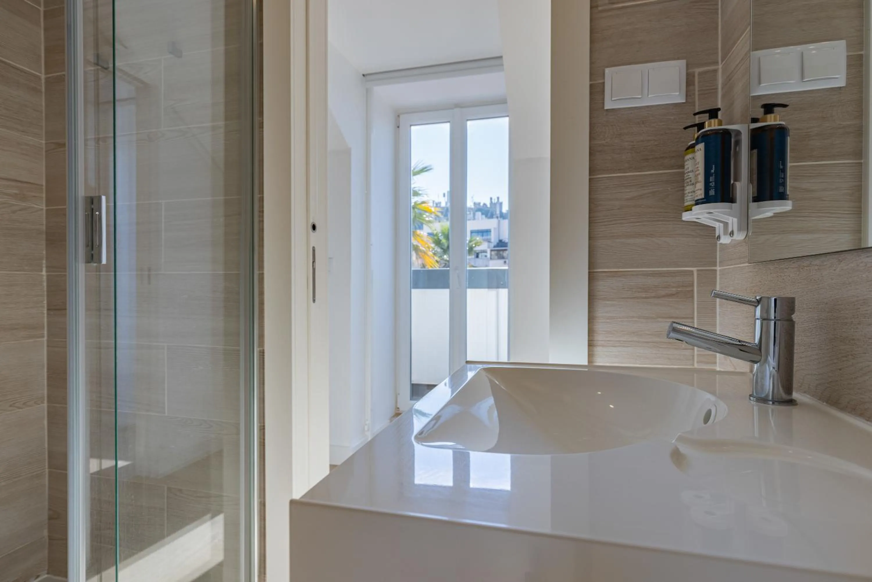 Bathroom in Garcia 28 by LovelyStay