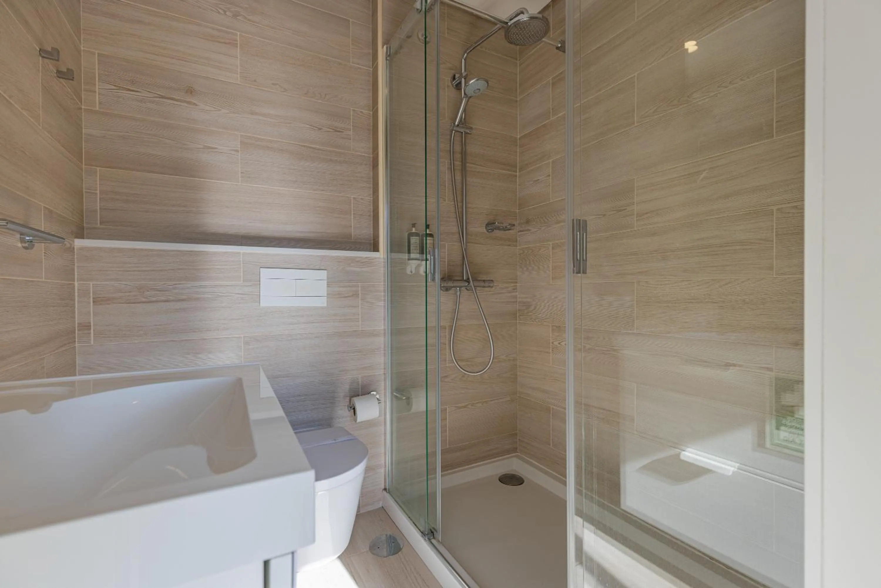 Bathroom in Garcia 28 by LovelyStay