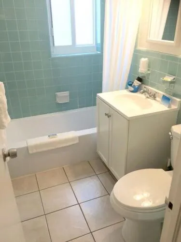 Bathroom in Great Escape Apartments By Lowkl