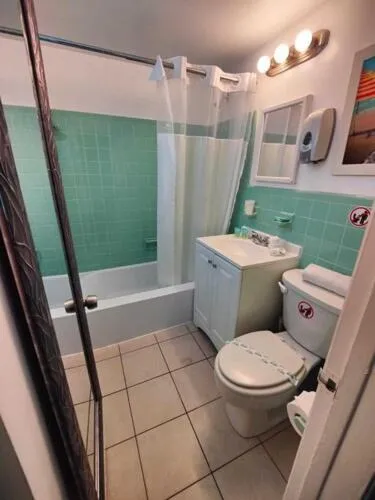 Bathroom in Great Escape Apartments By Lowkl