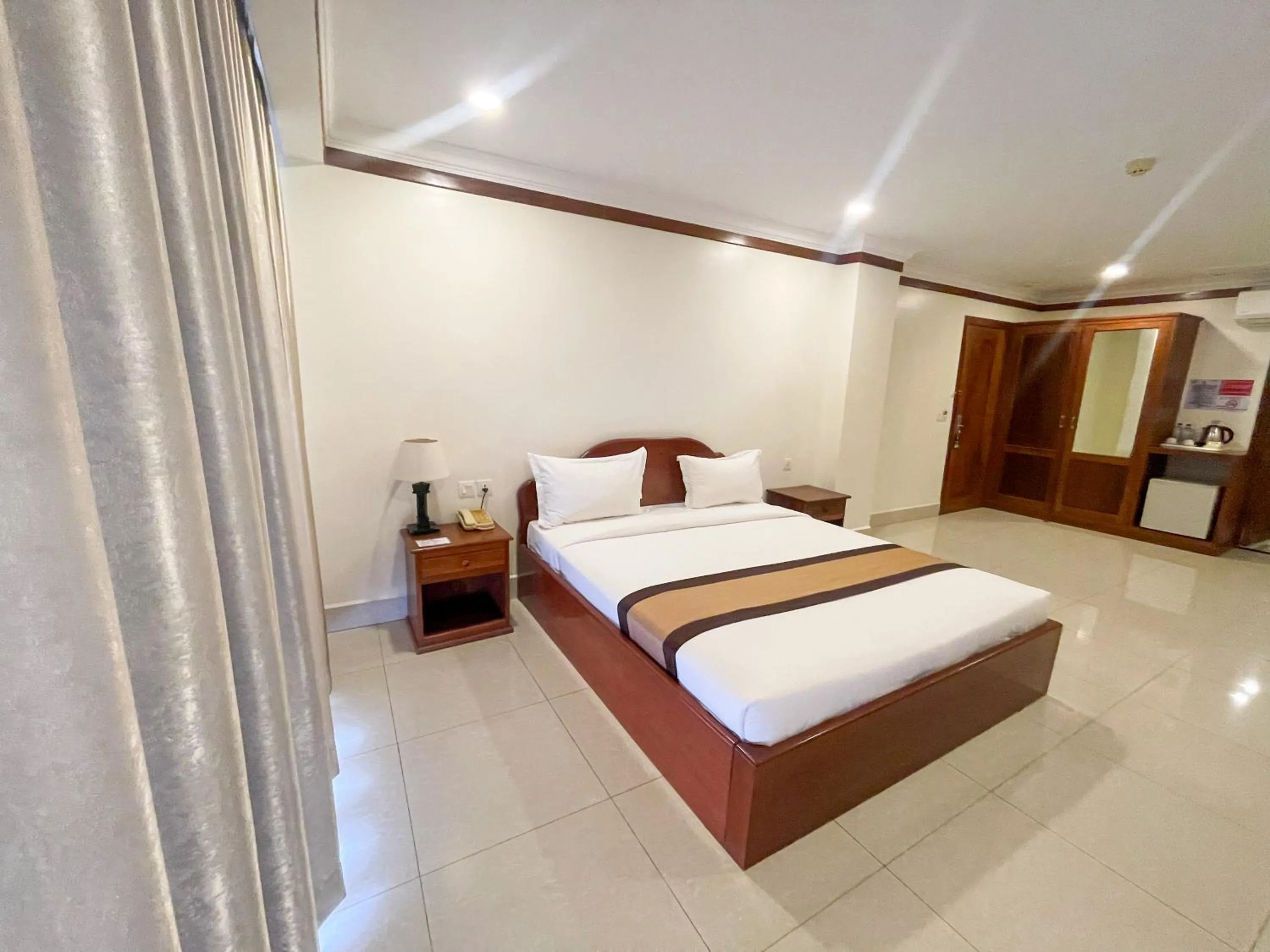 Bed in Pursat Riverside Hotel & Spa