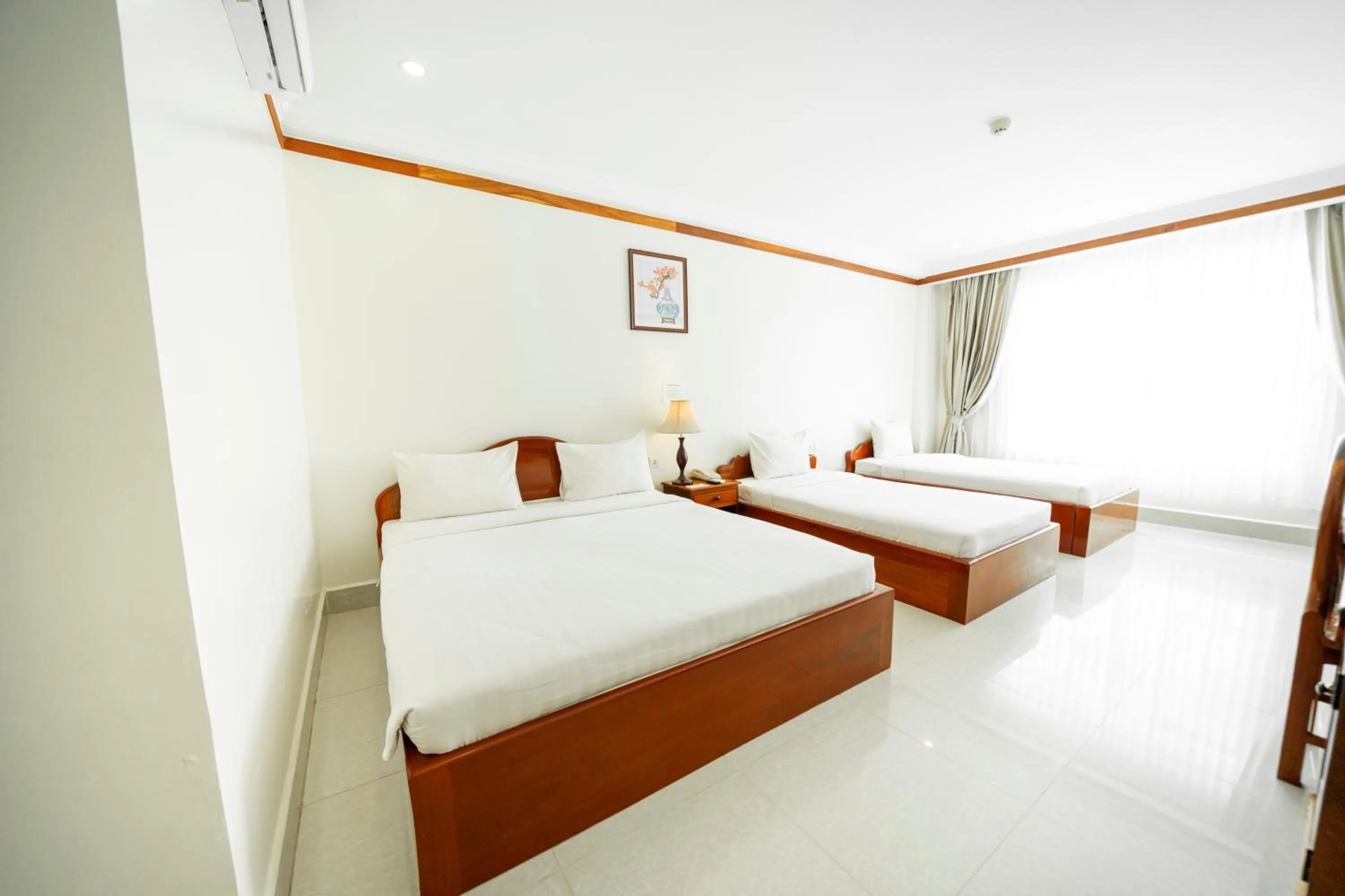 Bed in Pursat Riverside Hotel & Spa