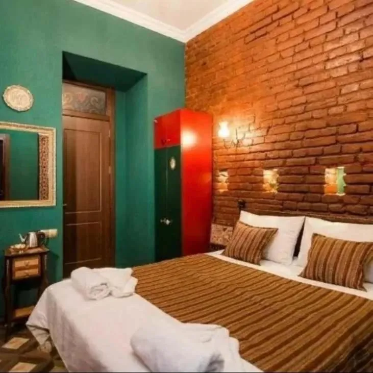 Bed in Vorontsoff Inn Boutique Hotel