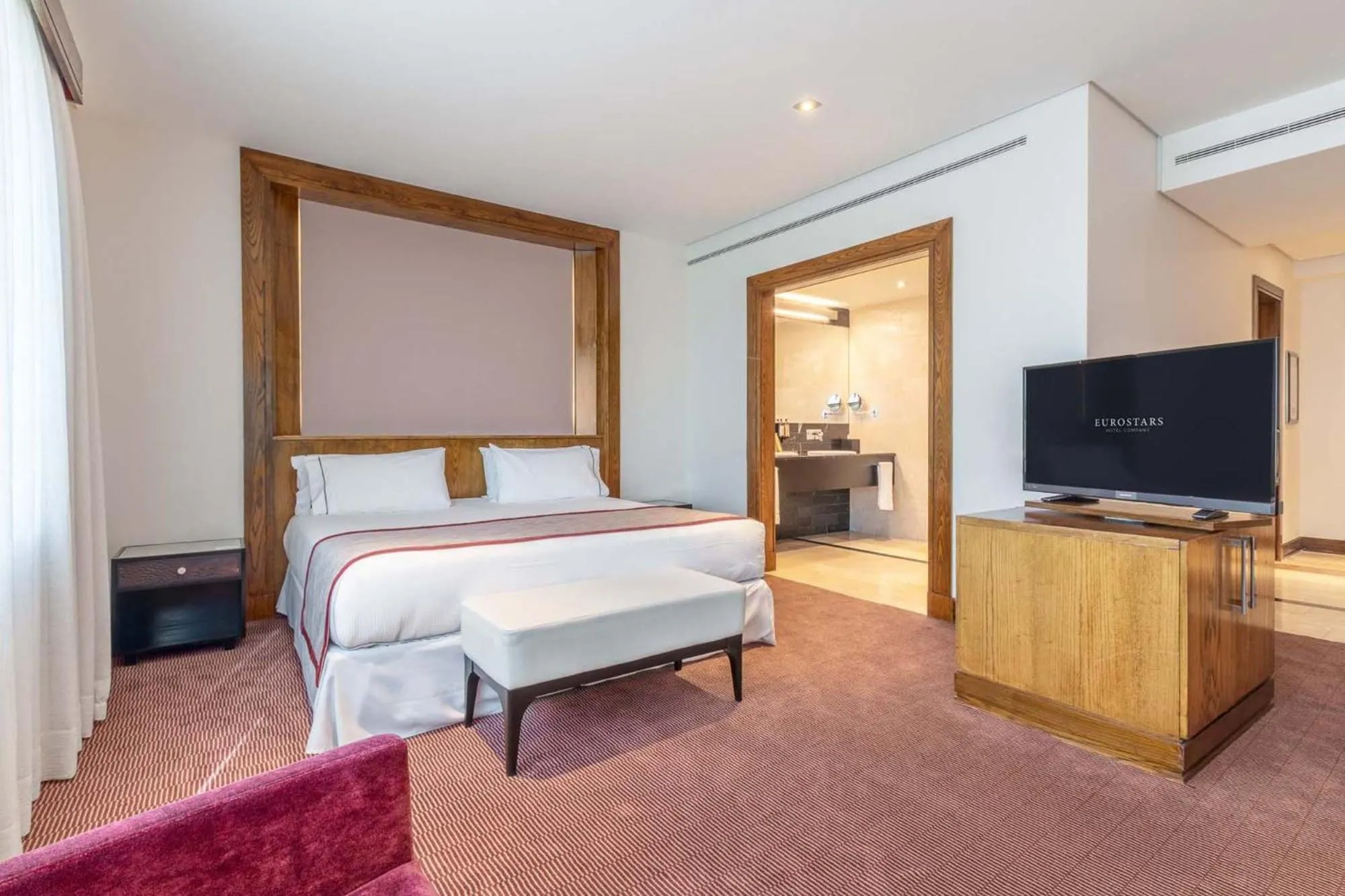 Bed in Eurostars Suites Mirasierra