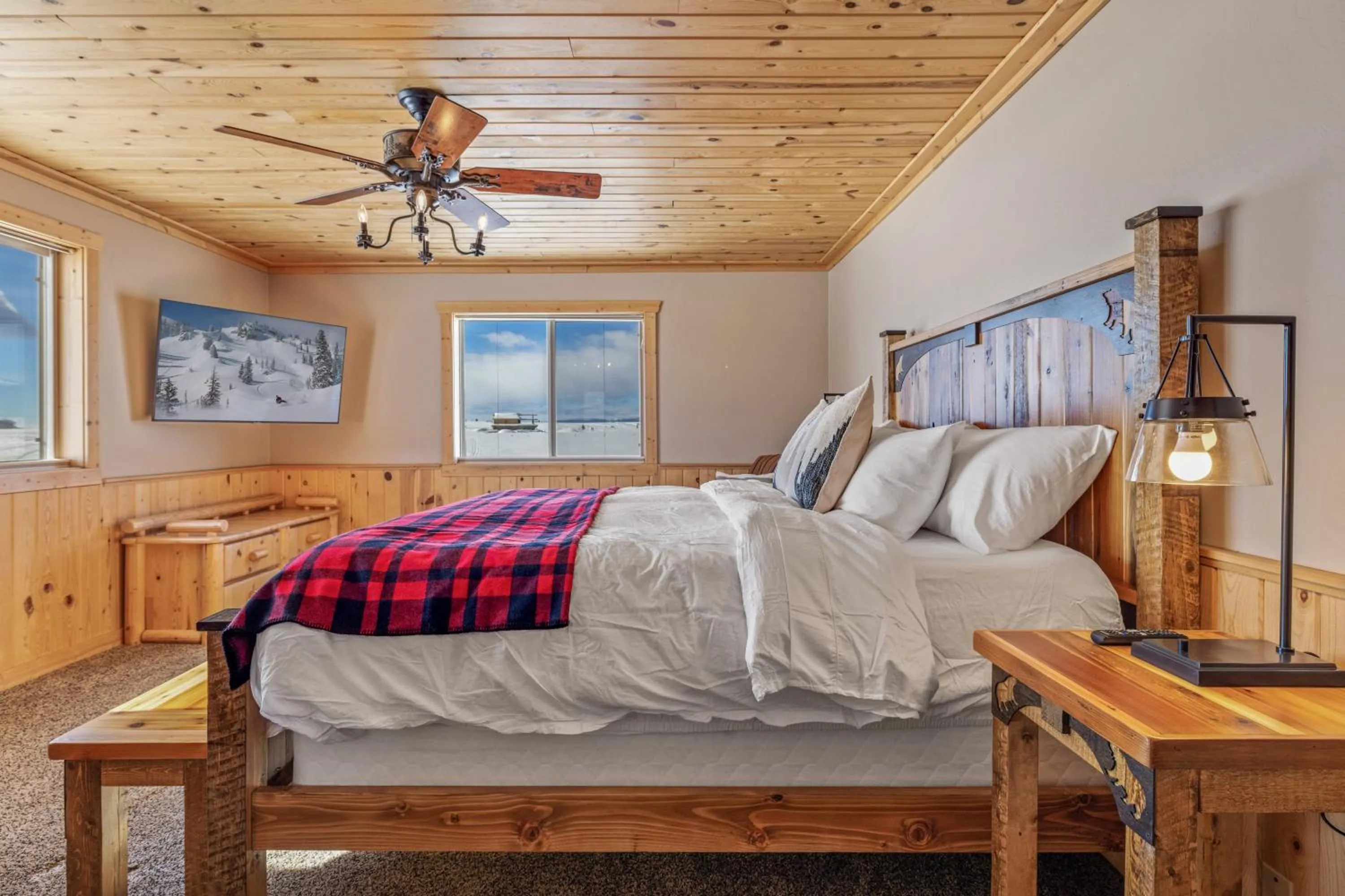 Bed in Liberty Lodge by KABINO Hot Tub Air Hockey 3 Living Rooms 7 bedrooms Boat Launch Reservoir ATV Snowmobile Trails WiFi