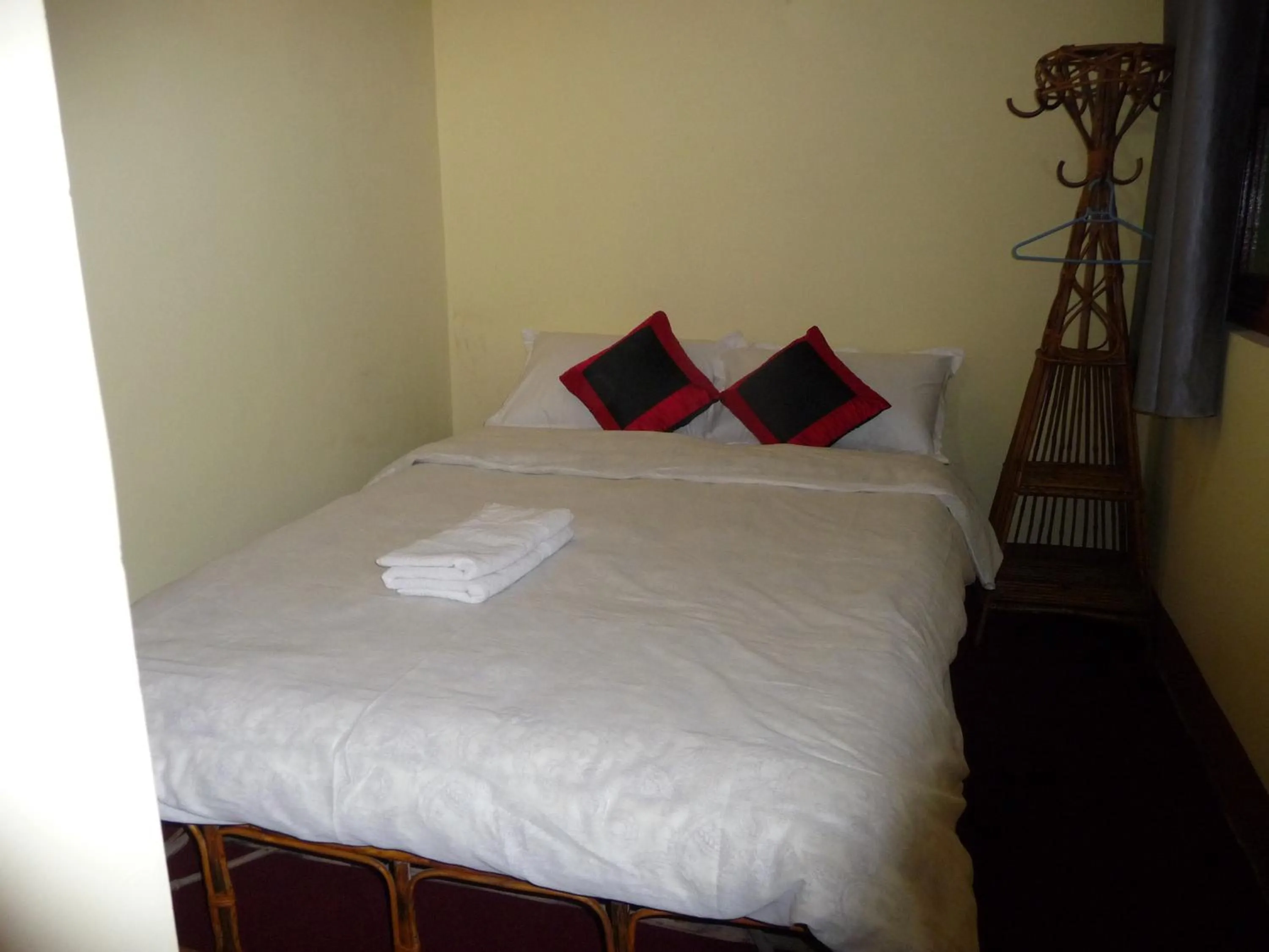 Bed in HOTEL RUPAKOT AND ROOFTOP RESTAURANT