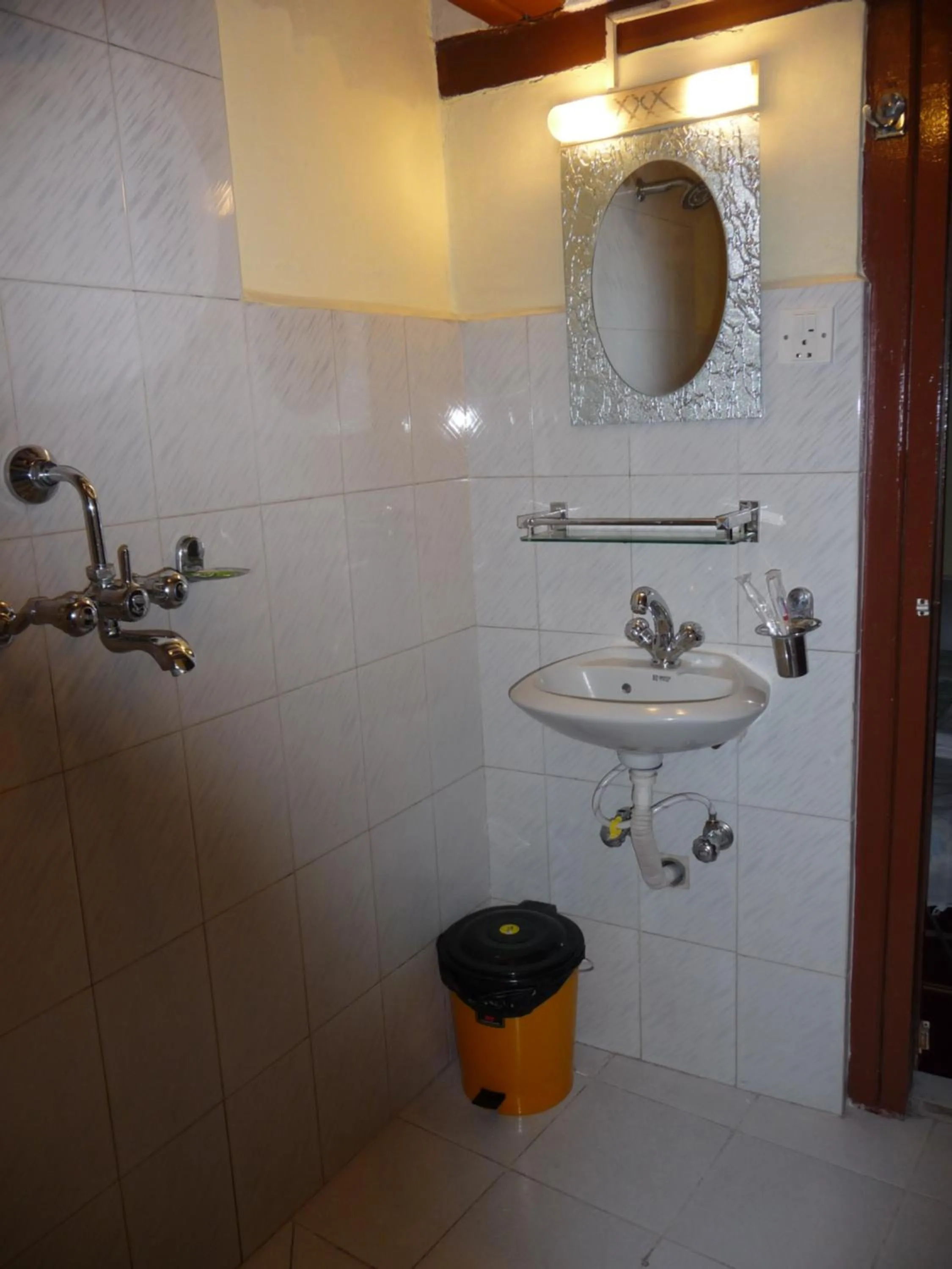 Bathroom in HOTEL RUPAKOT AND ROOFTOP RESTAURANT