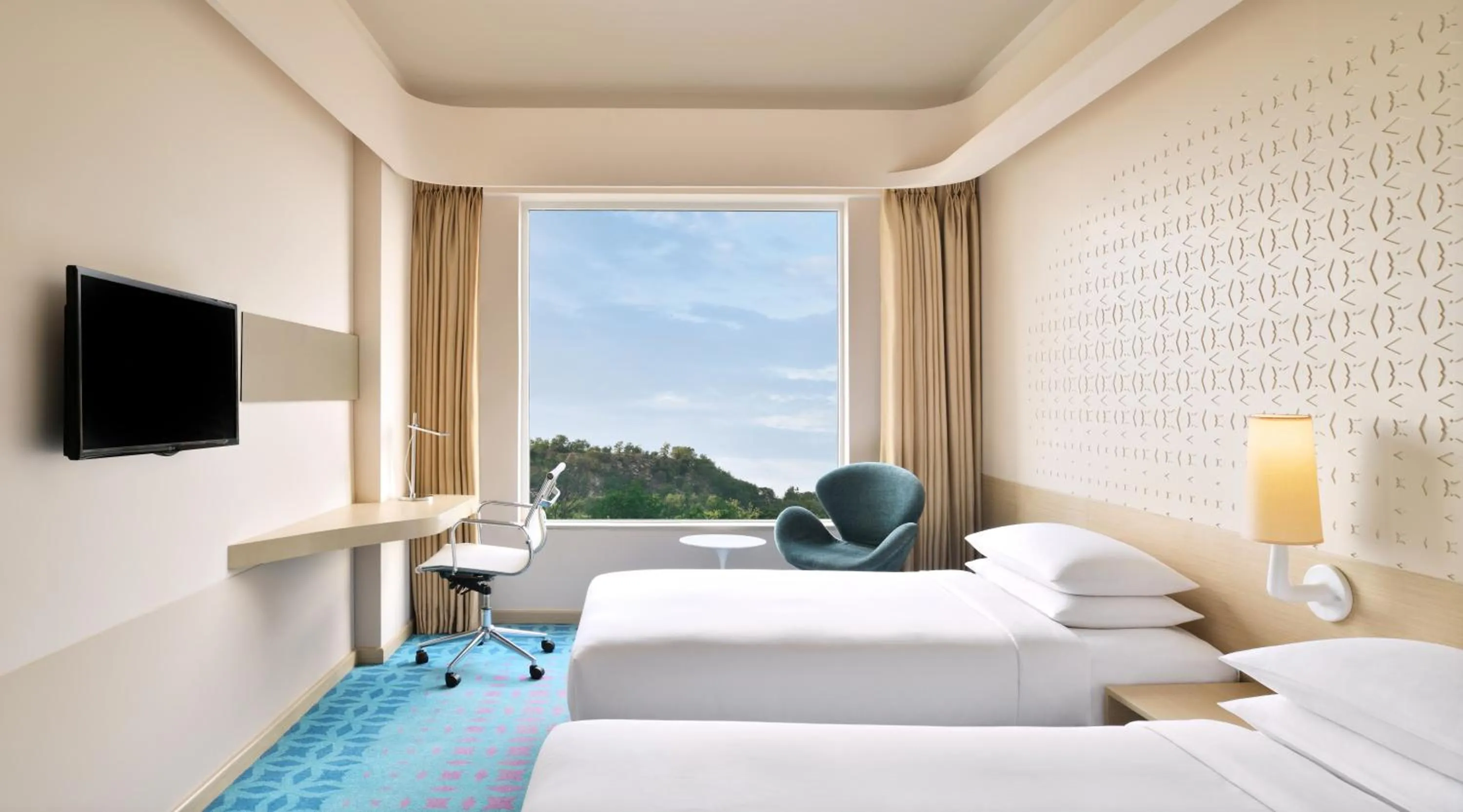 Photo of the whole room, Bed in Fairfield by Marriott Hyderabad Gachibowli