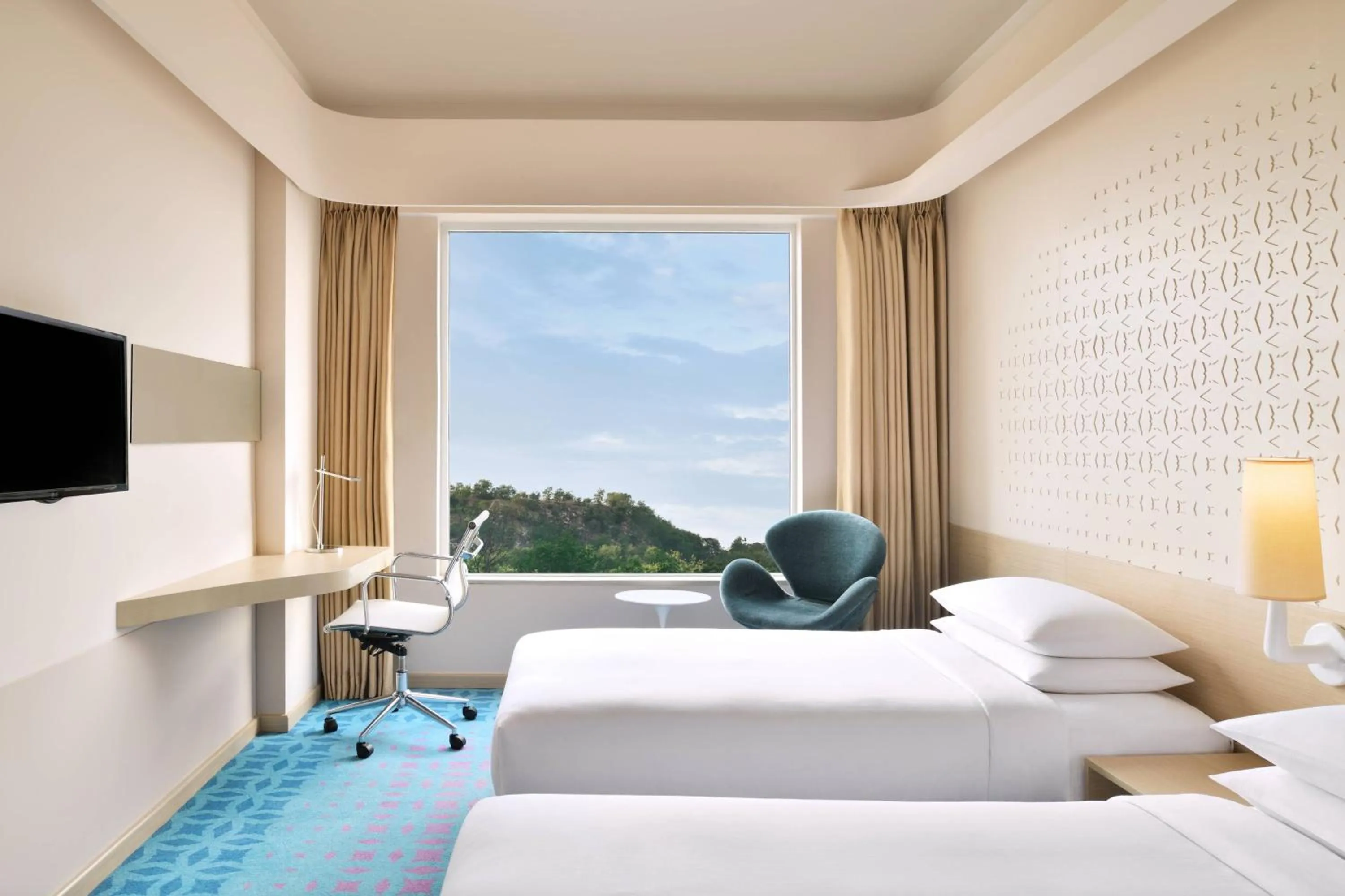 Photo of the whole room, Bed in Fairfield by Marriott Hyderabad Gachibowli