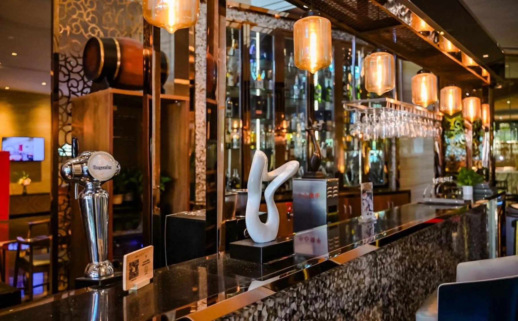 Lounge or bar in Crowne Plaza Shanghai Noah Square by IHG