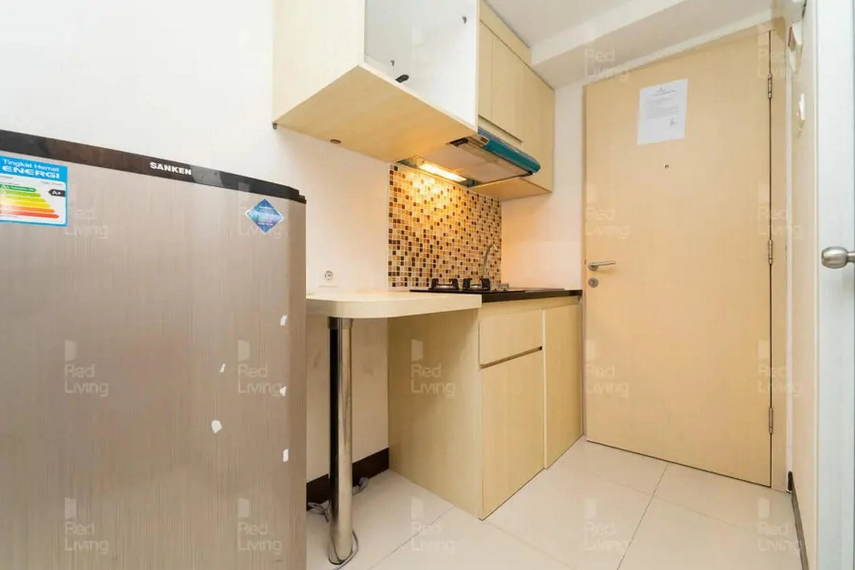 Kitchen or kitchenette in RedLiving Apartemen 19 Avenue - Amanah Room