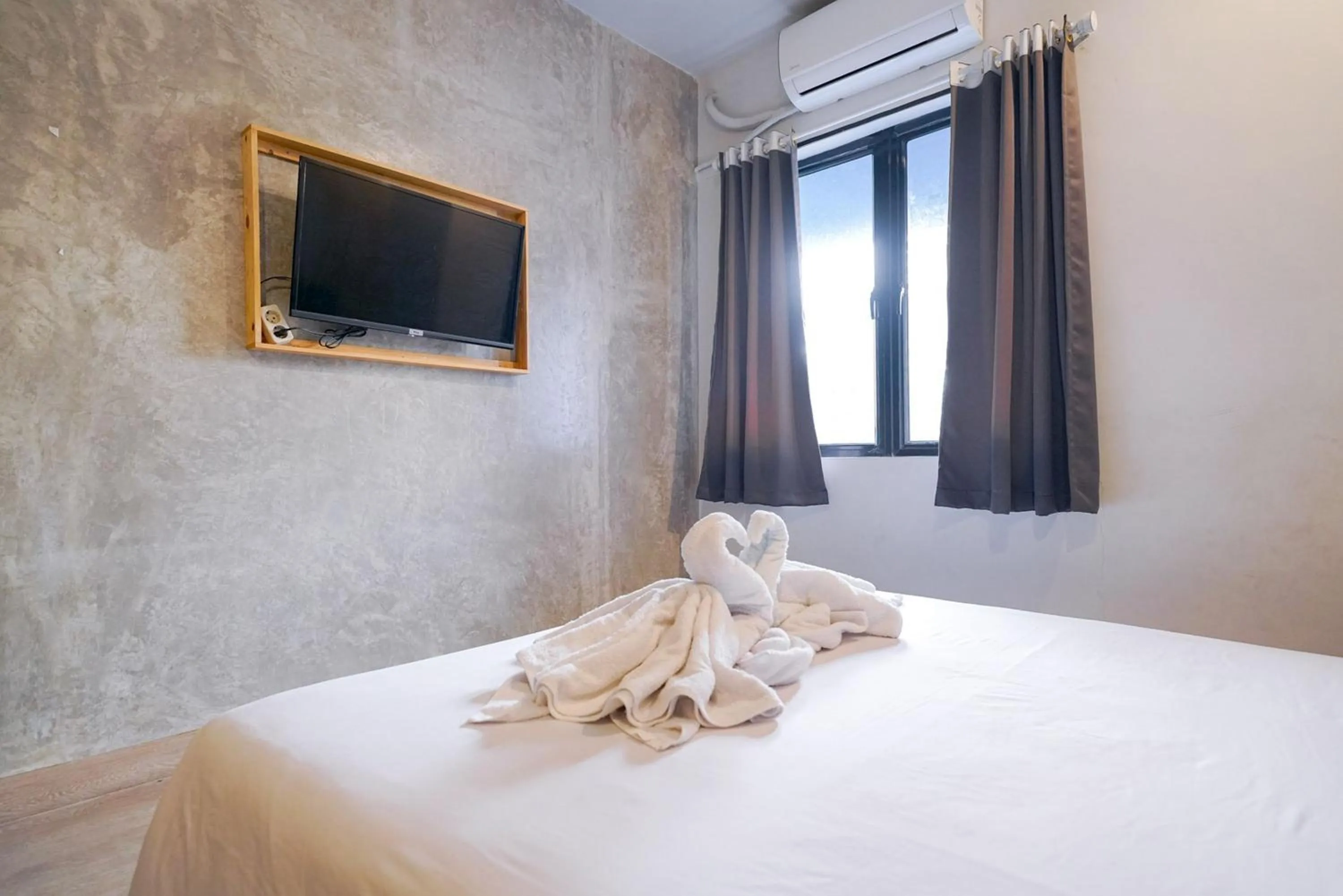 Bedroom, Bed in Urbanview Hotel Syariah De Umbrella Ciputat