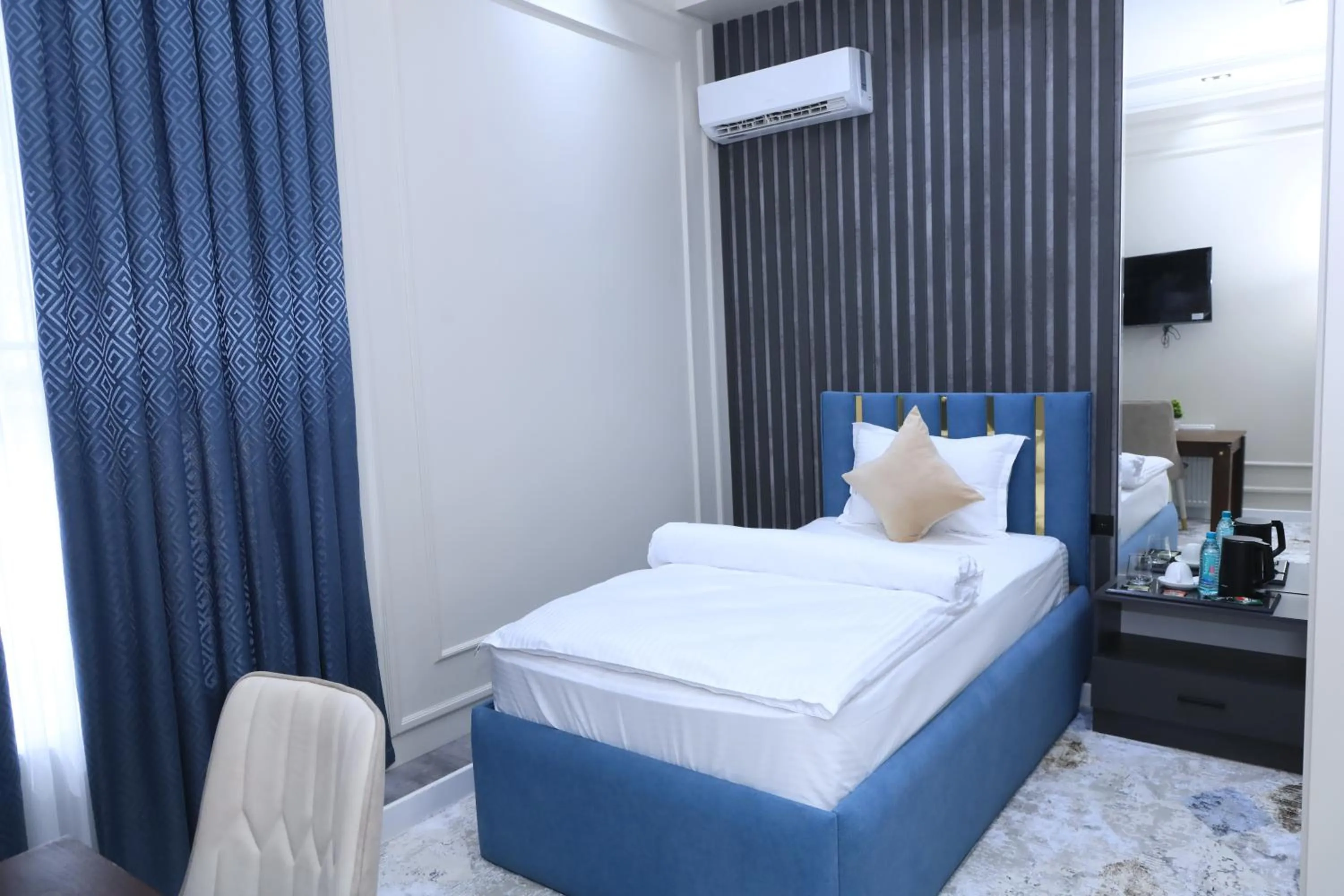 TV and multimedia, Bed in FIRDAVS HOTEL