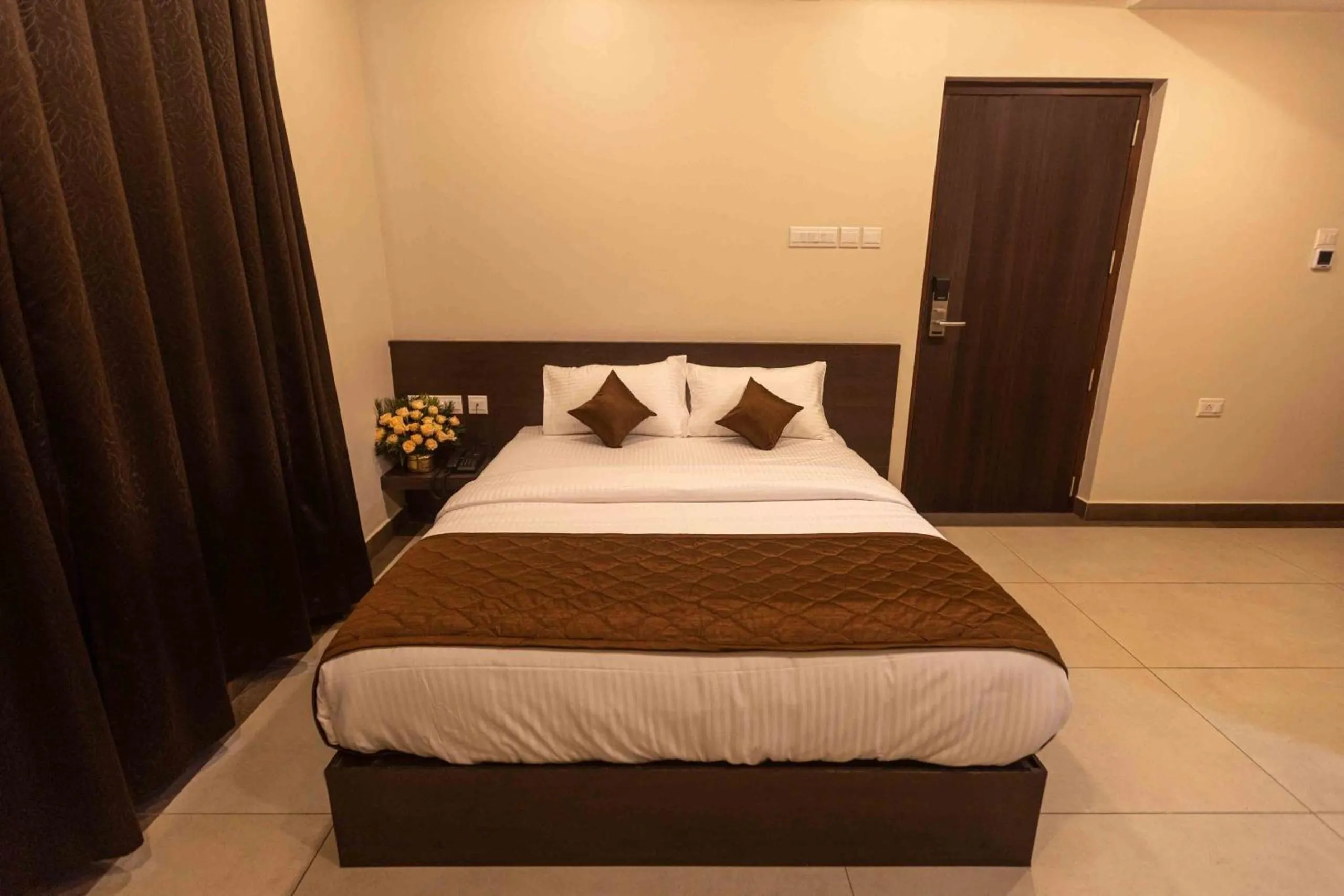 Bed in HOTEL PANKAJ RESIDENCY
