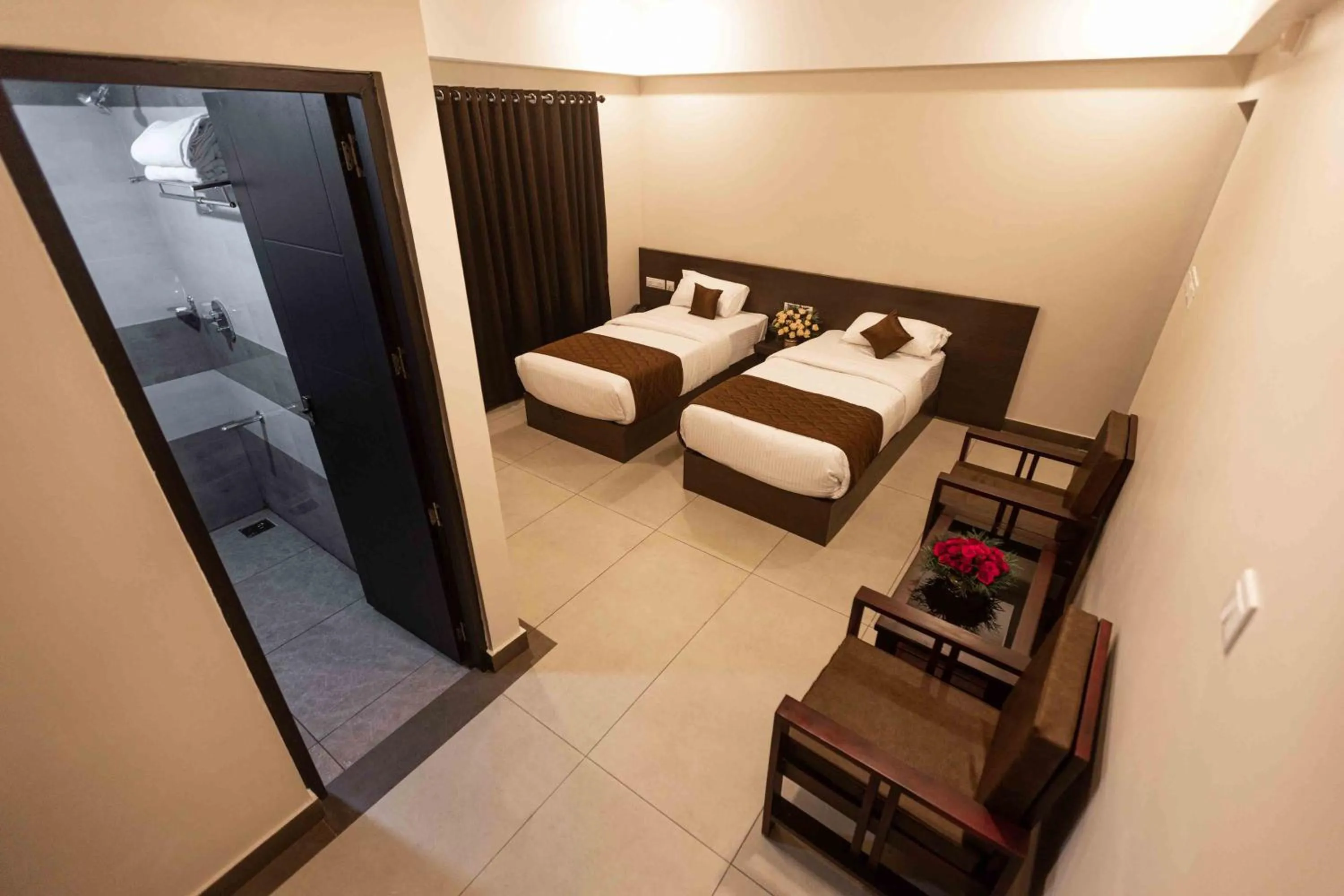 Bed in HOTEL PANKAJ RESIDENCY