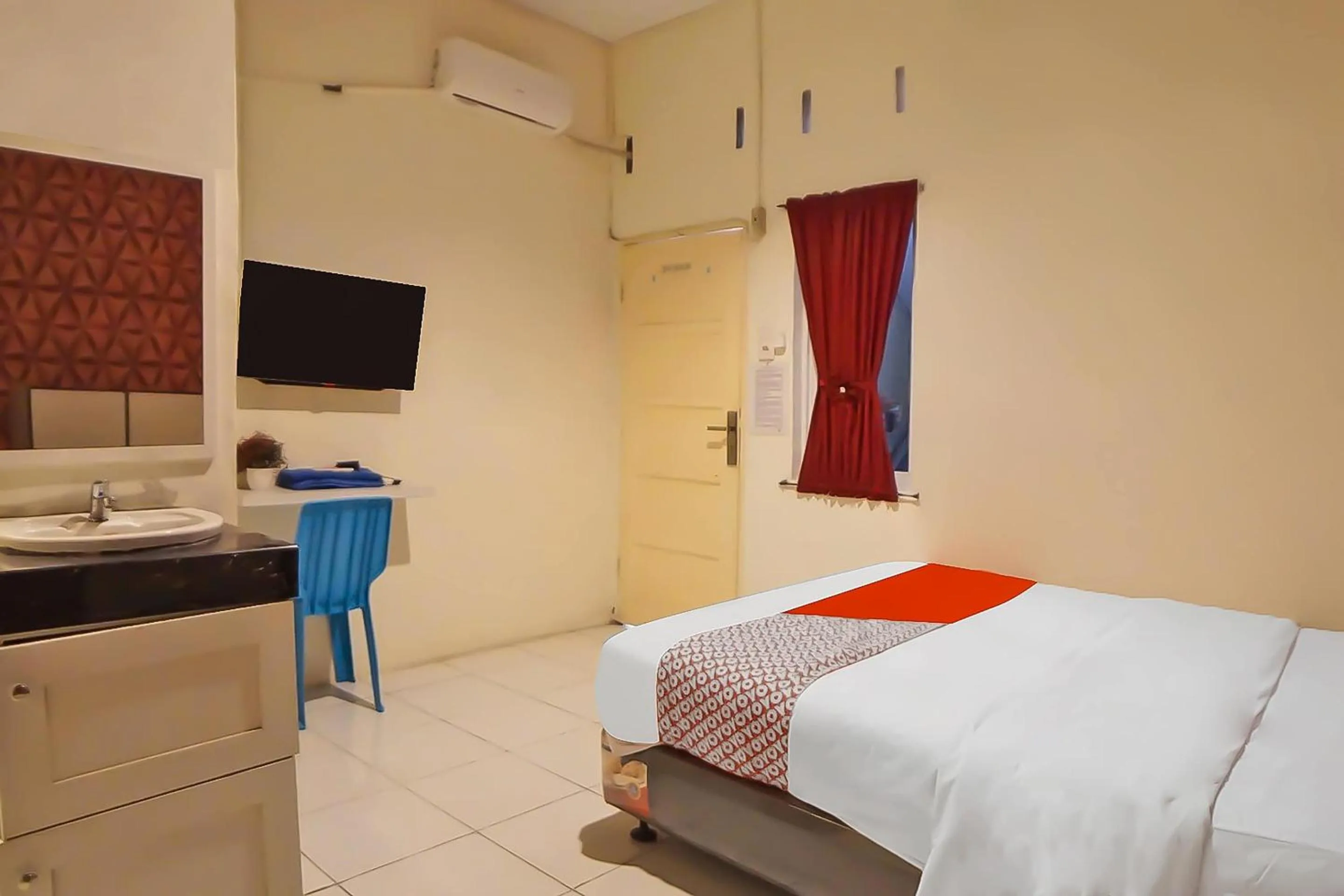 Bedroom in Hotel O N Guesthouse