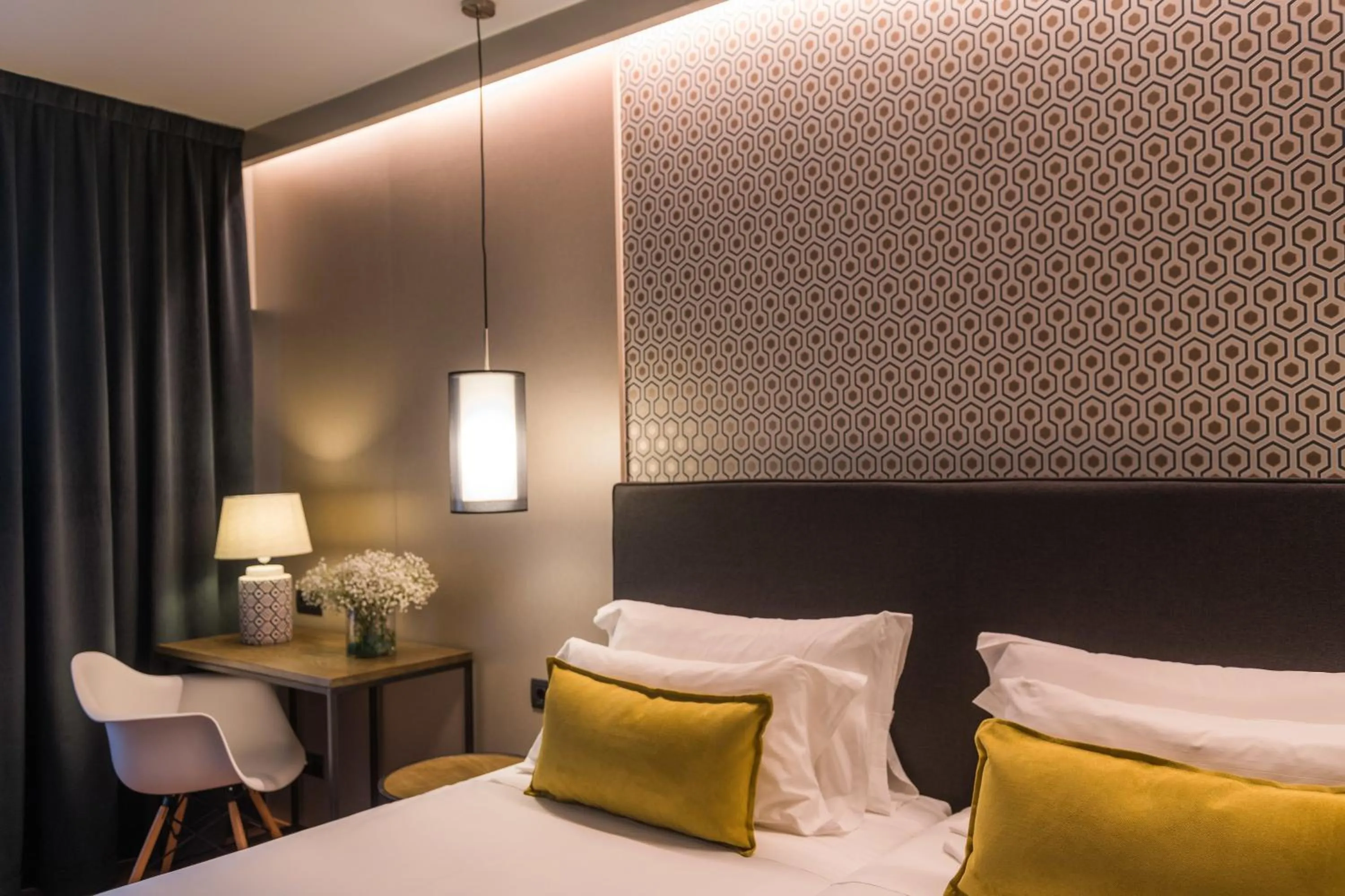 Bed in Up Rooms Vic Hotel