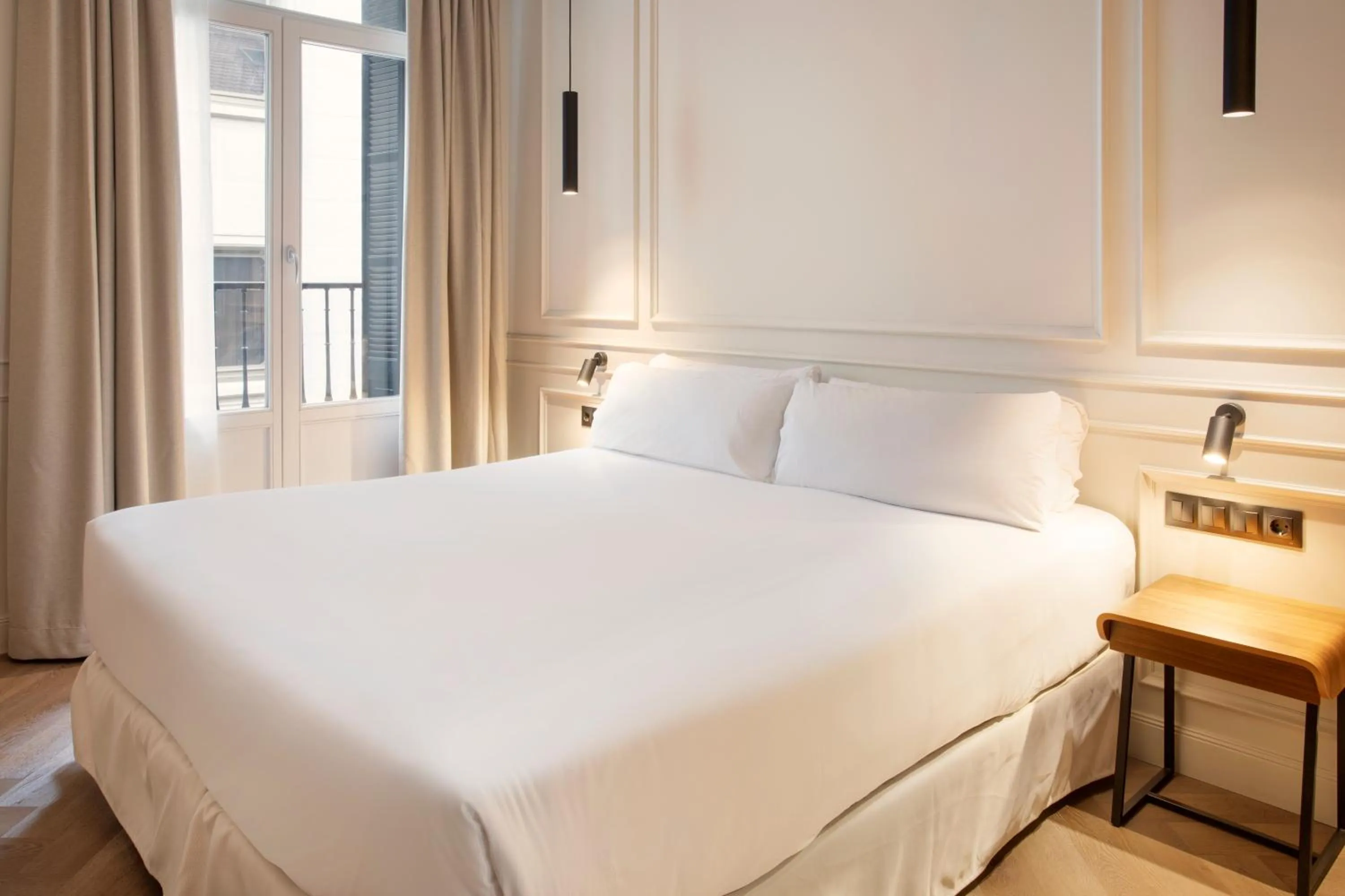 Bed in Bilder Boutique Hotel