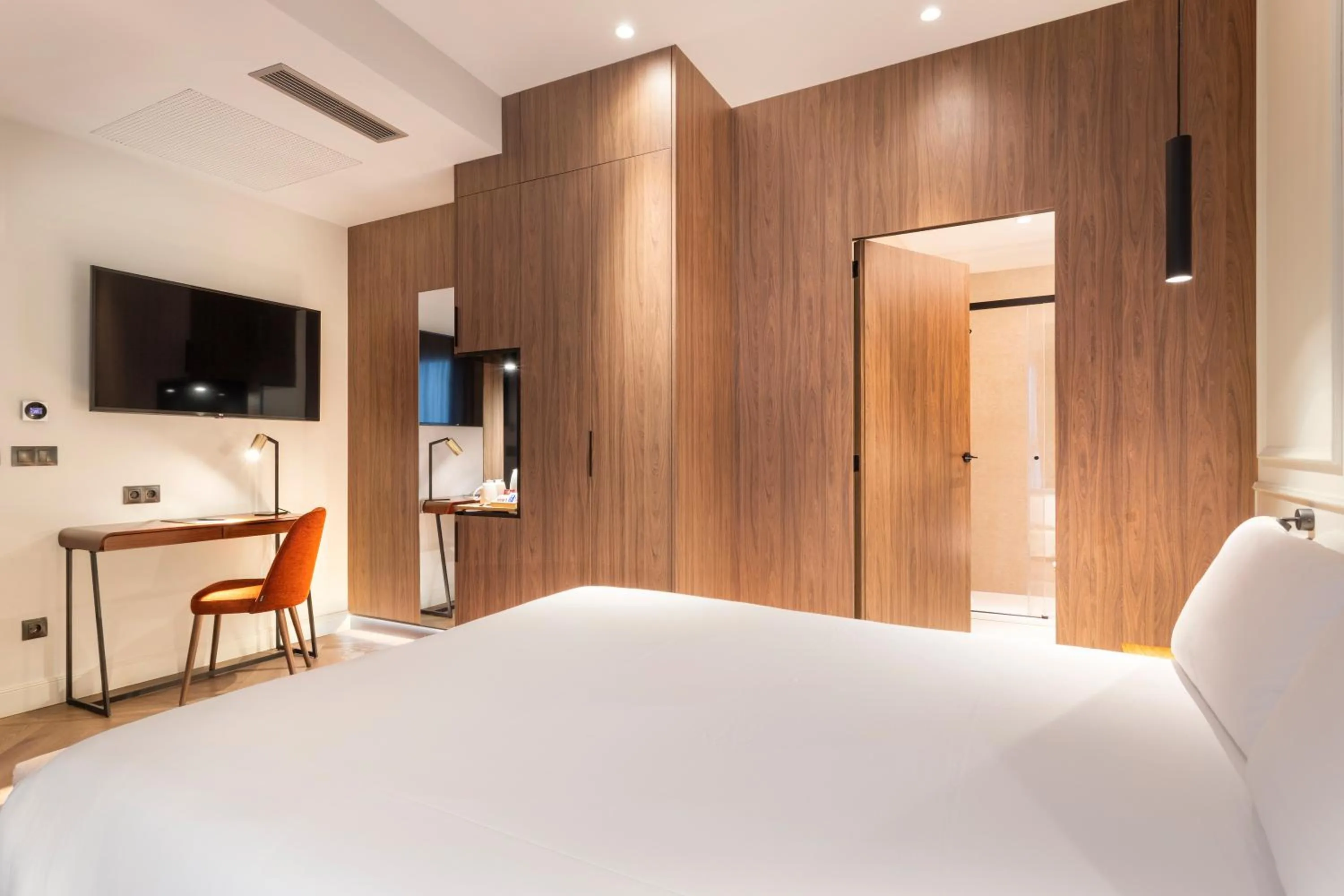 Bed in Bilder Boutique Hotel