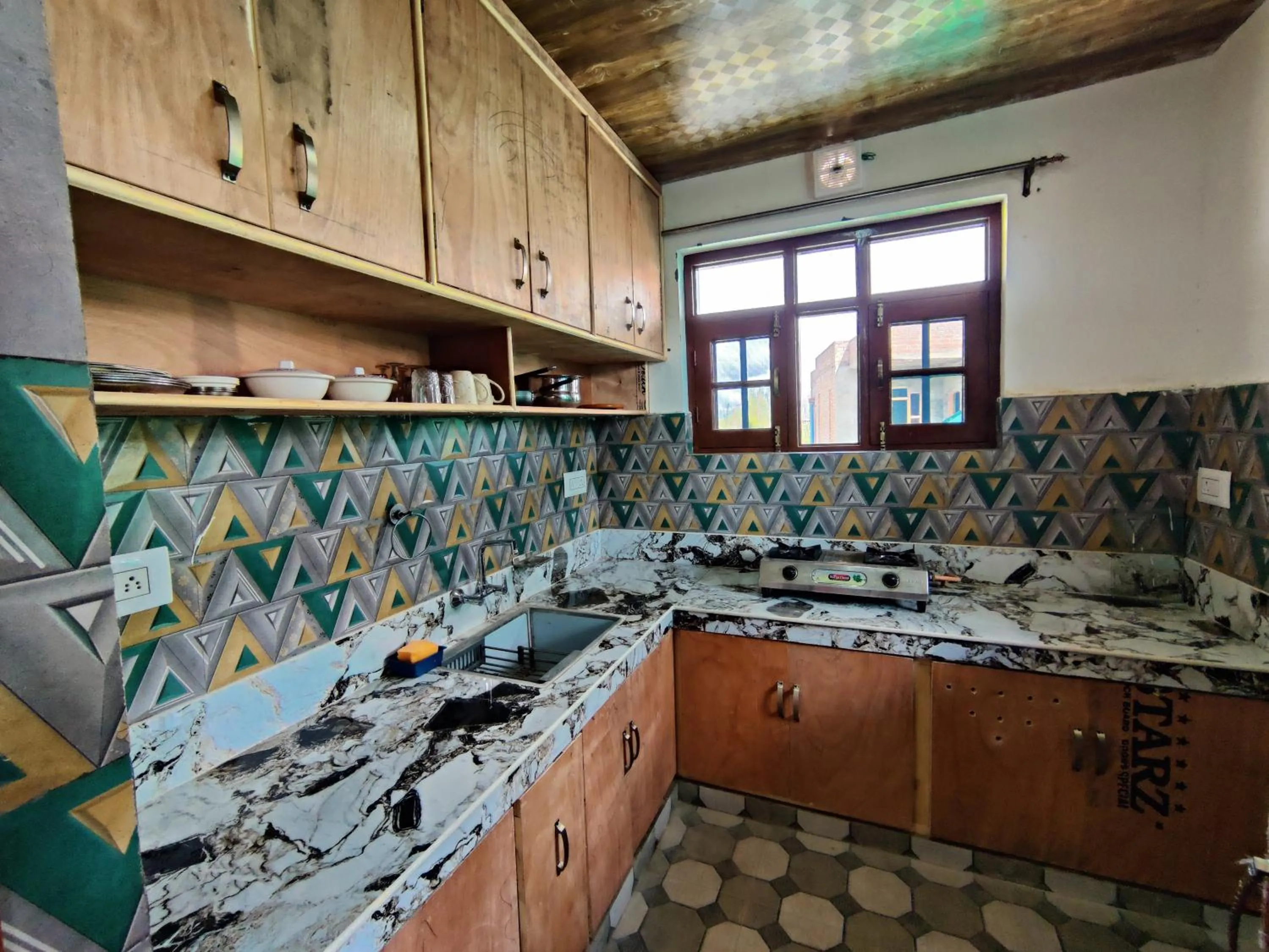 Kitchen or kitchenette in Kashmir Homestay