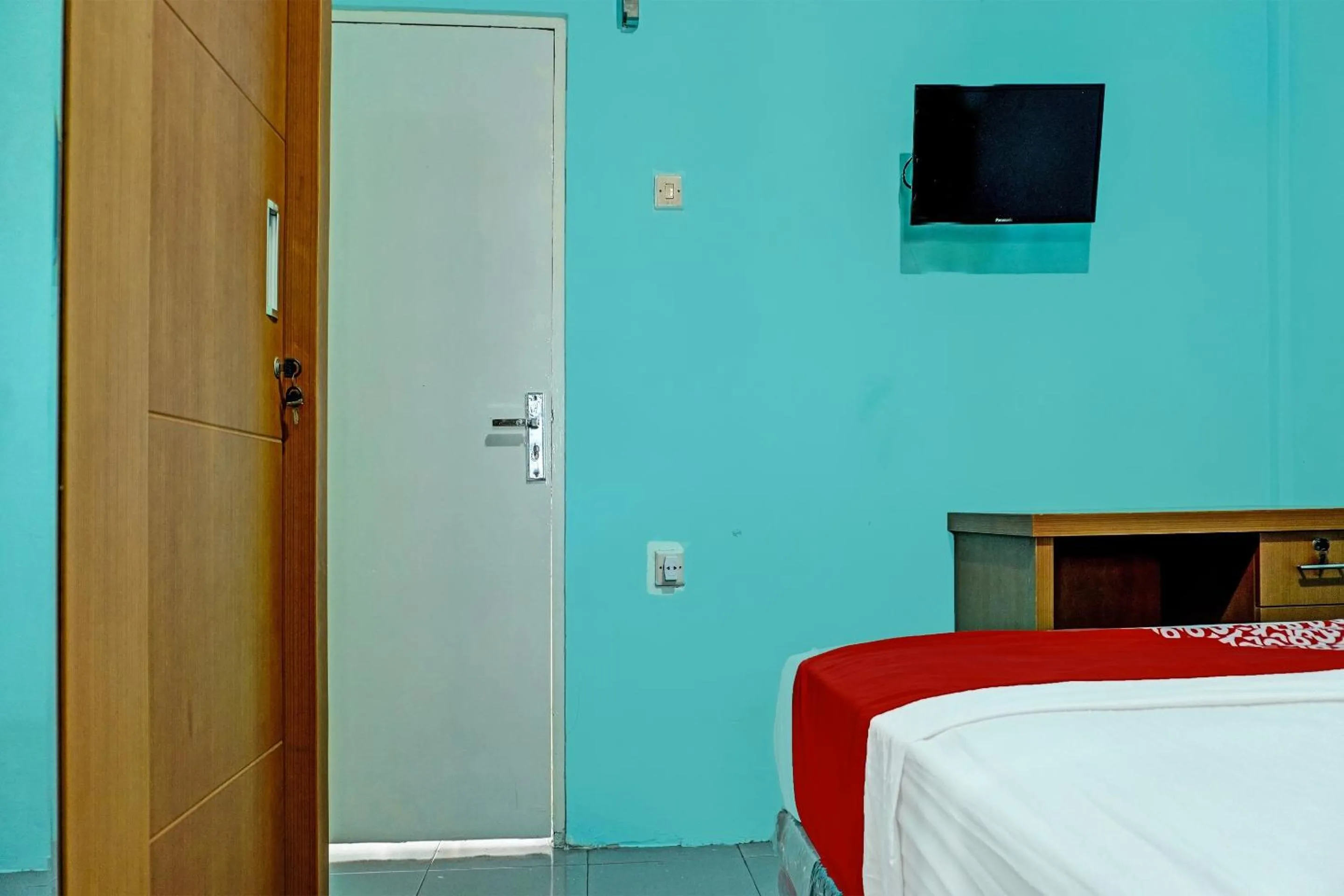 Bedroom, Bed in Hotel O Home Stay Elis Cateliya Syariah