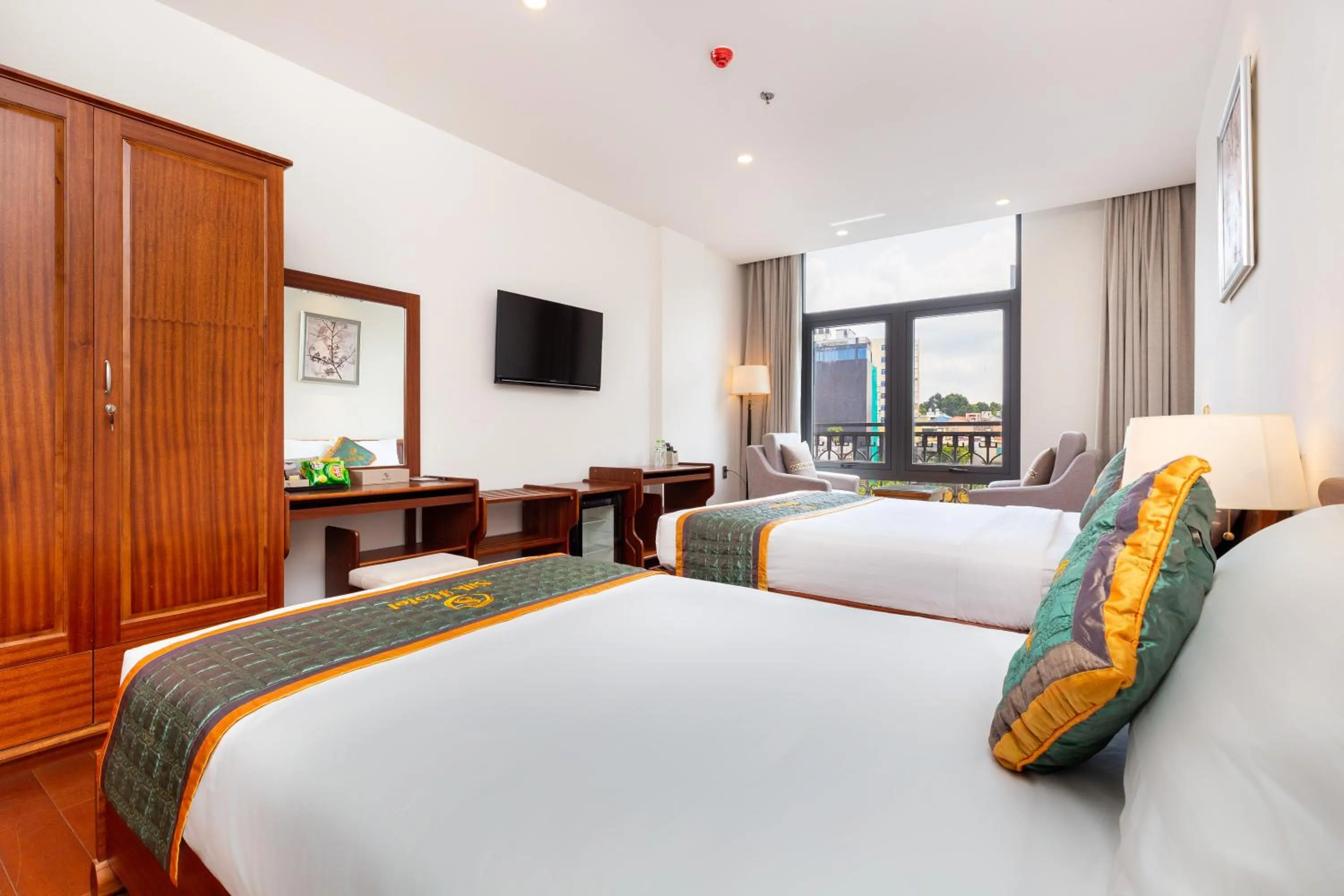 Bed in Silk Hong Ha airport hotel