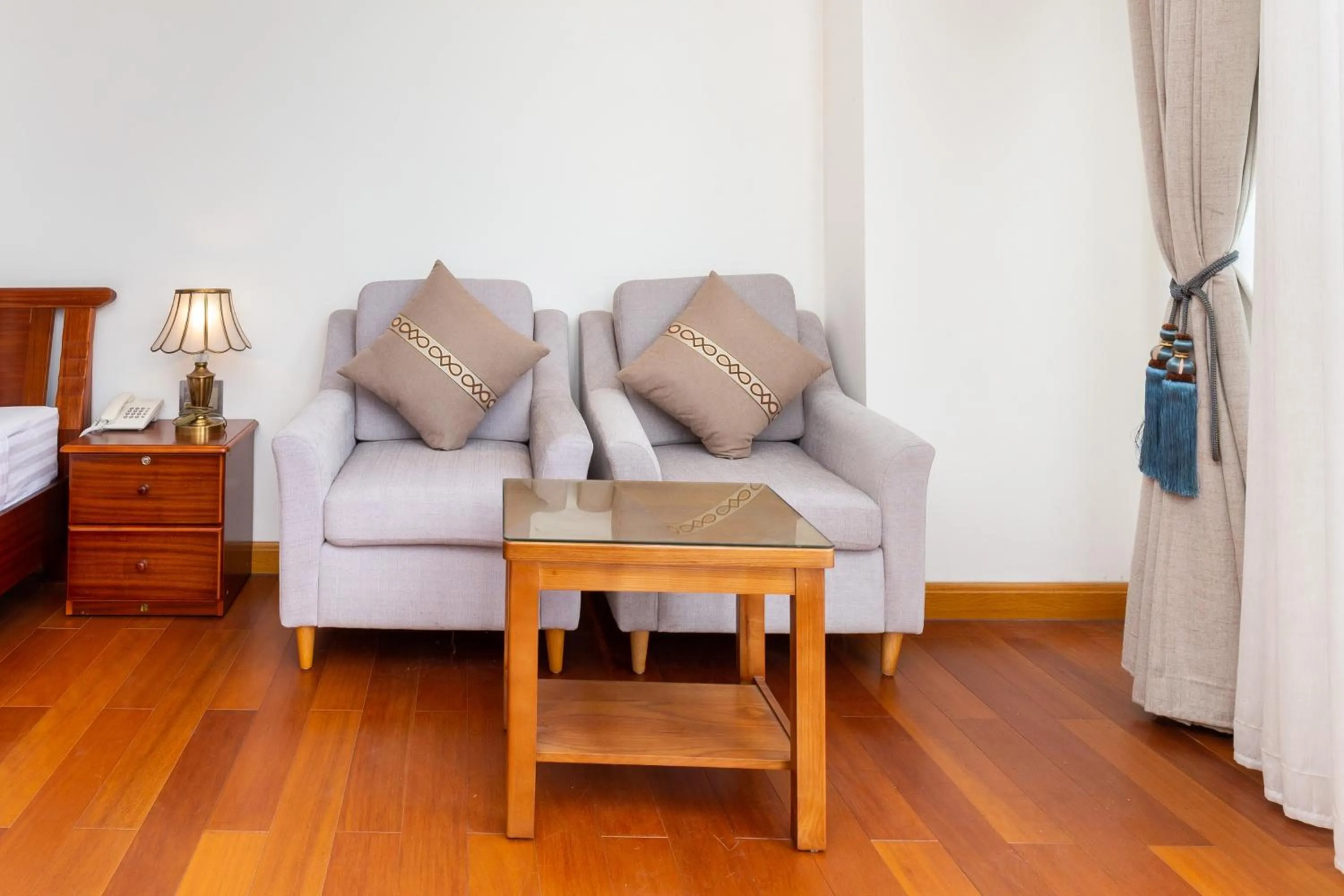 Seating area in Silk Hong Ha airport hotel