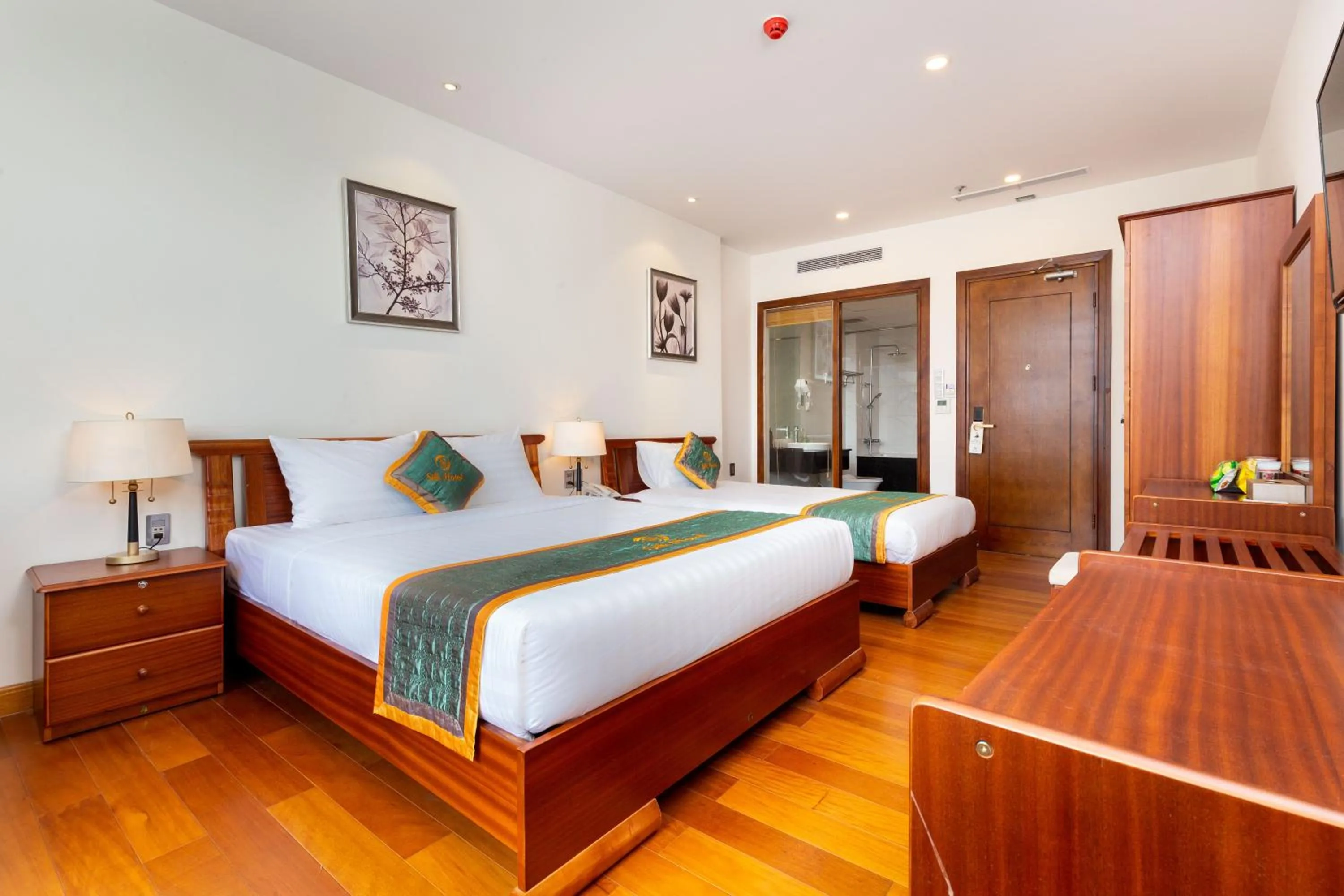 Bed in Silk Hong Ha airport hotel