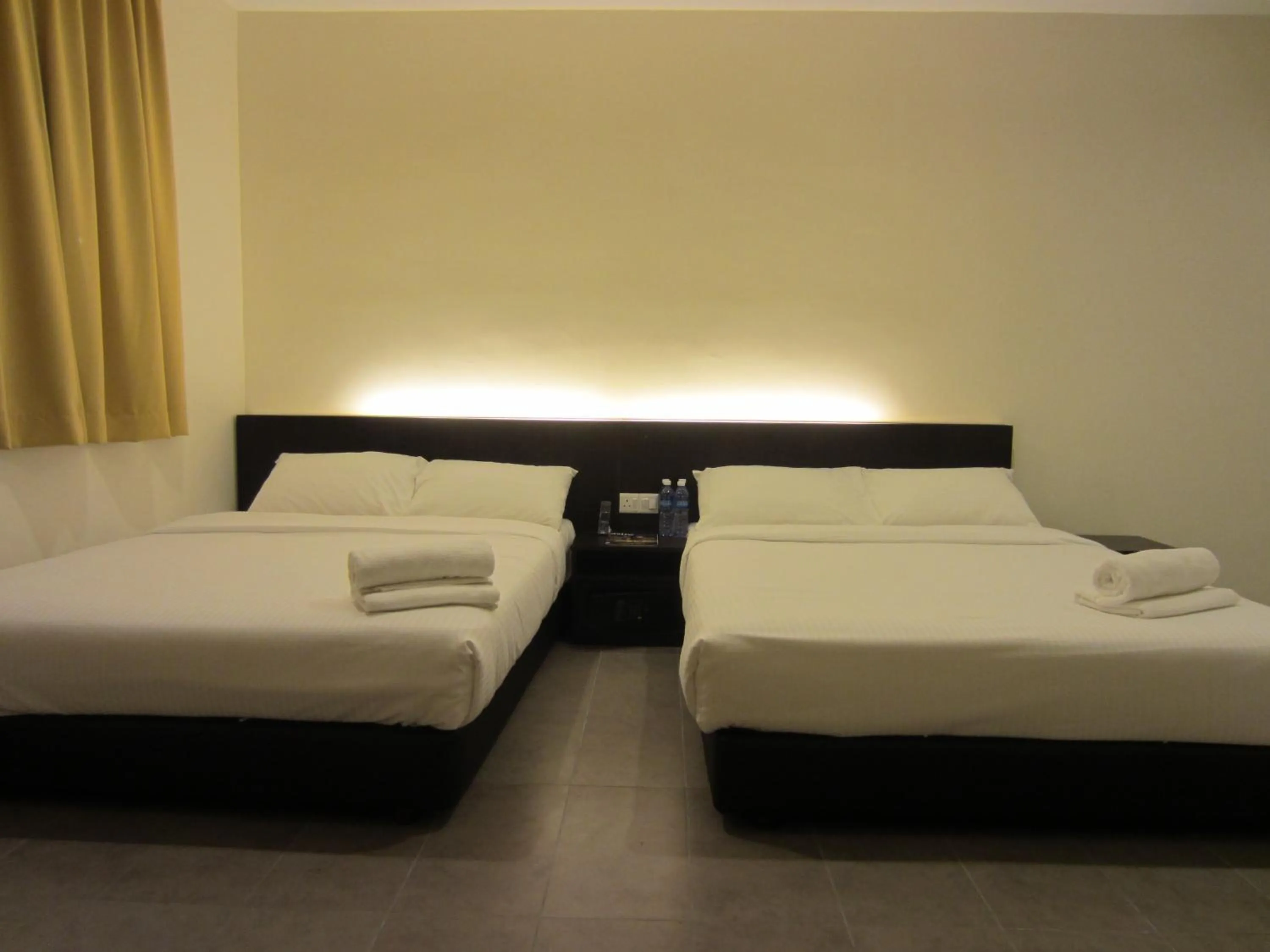 Bed in Merlin Hotel