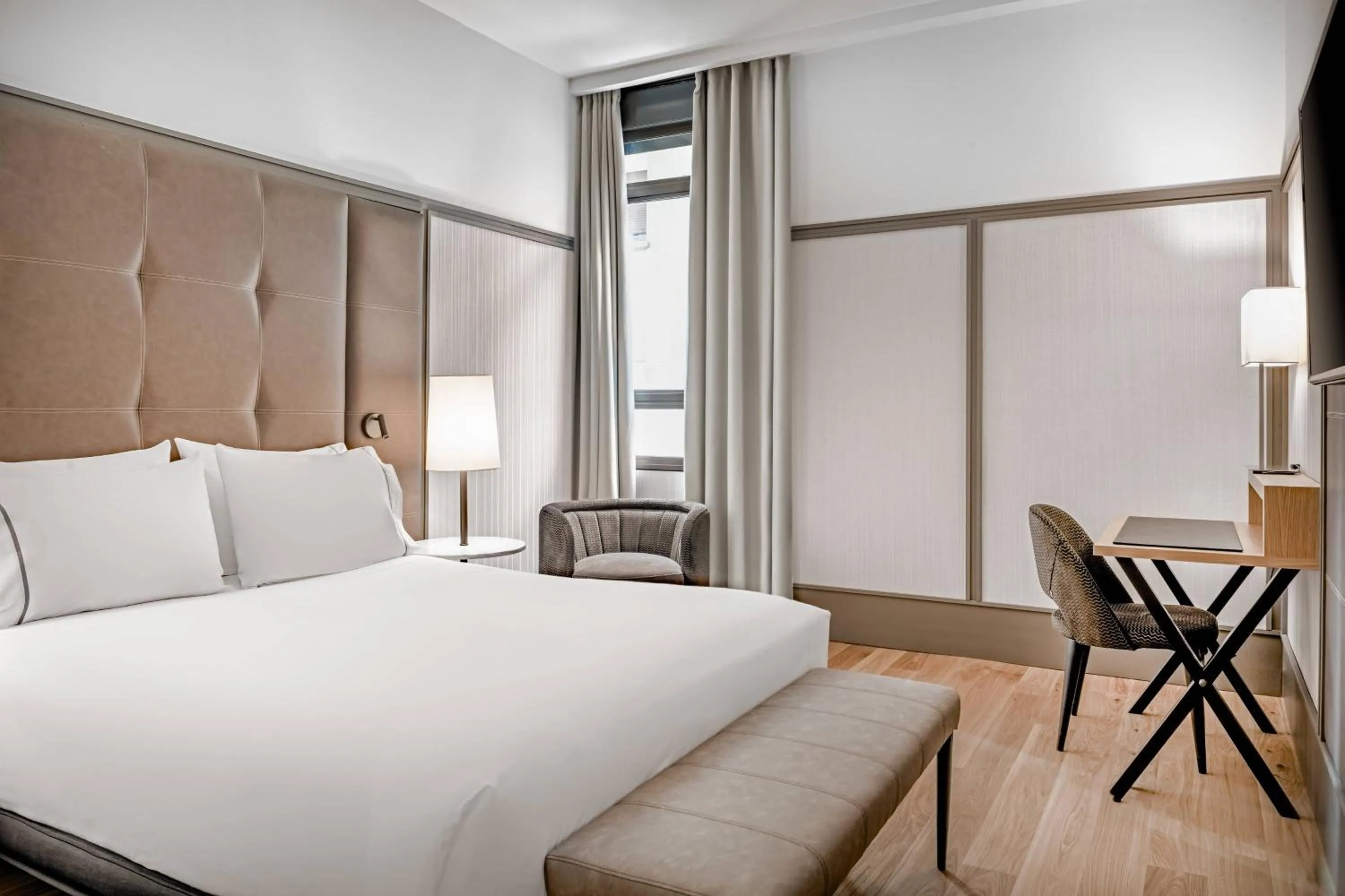 Photo of the whole room, Bed in AC Hotel Avenida de América by Marriott