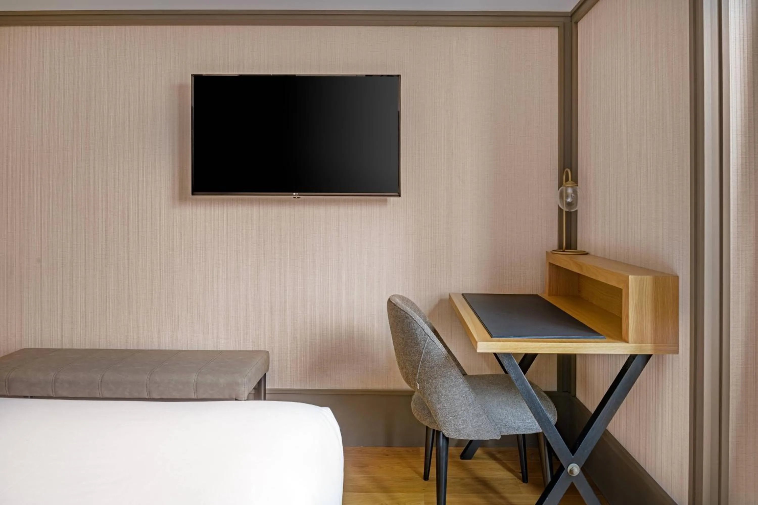 Photo of the whole room, Bed in AC Hotel Avenida de América by Marriott