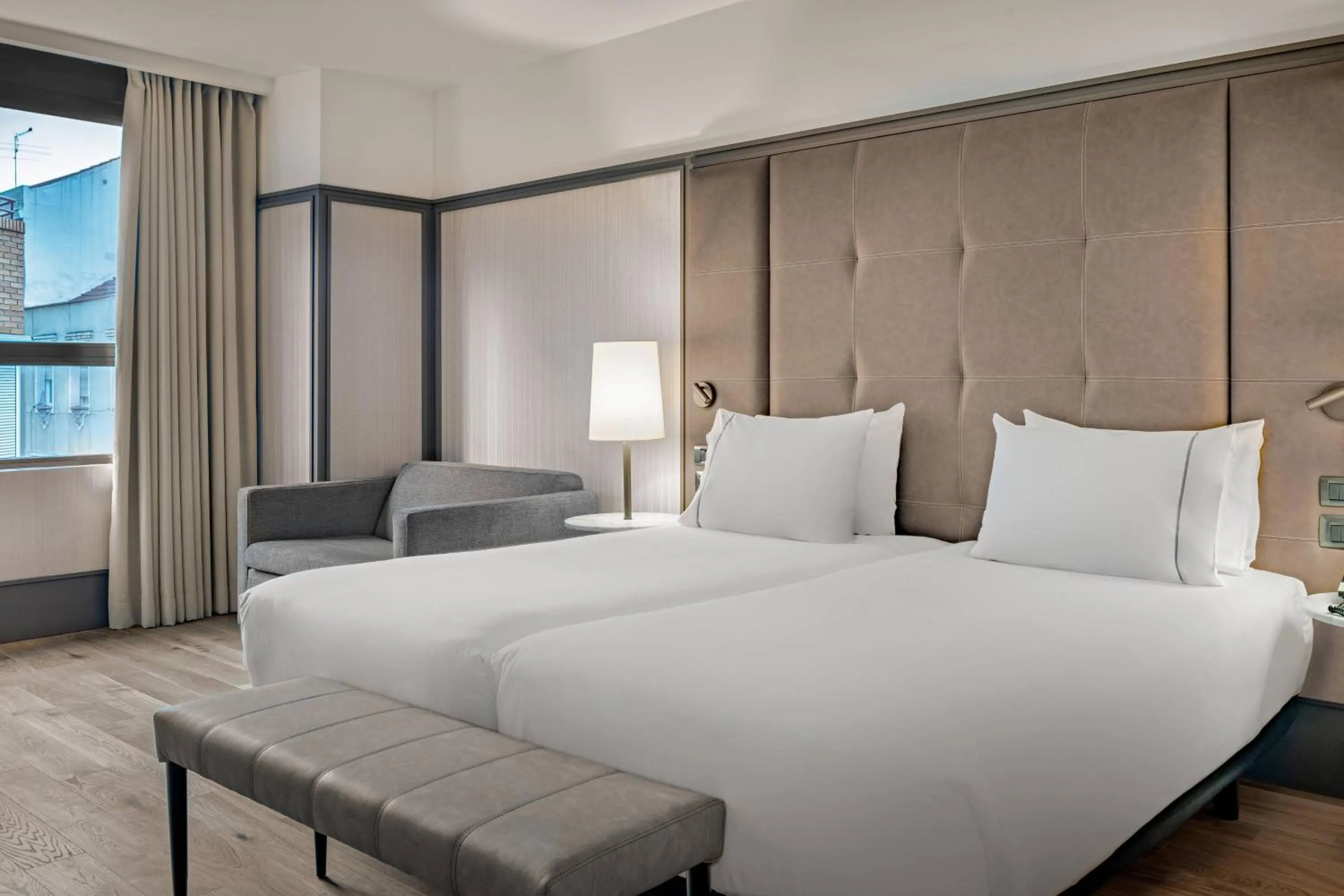 Photo of the whole room, Bed in AC Hotel Avenida de América by Marriott