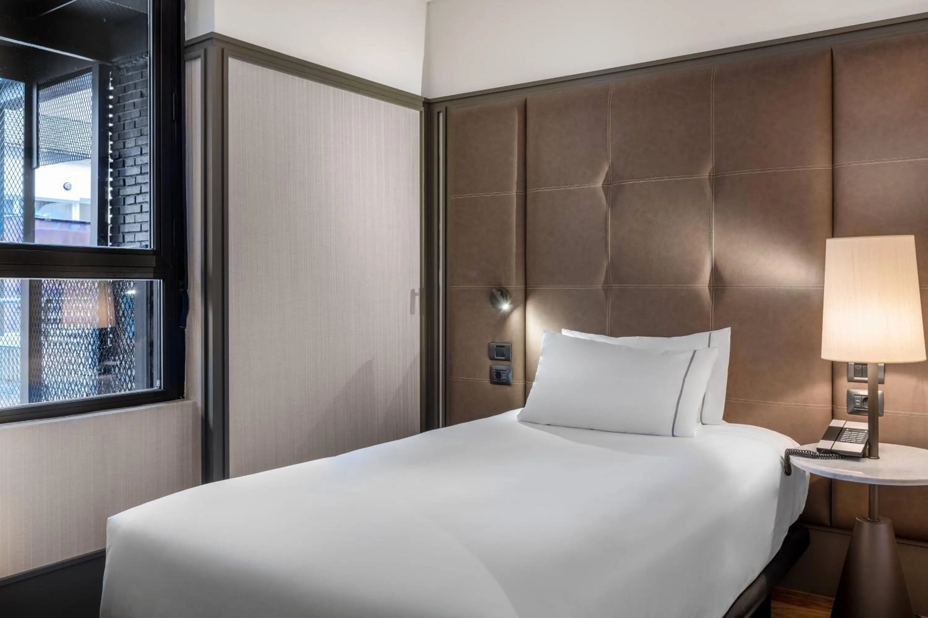 Photo of the whole room, Bed in AC Hotel Avenida de América by Marriott