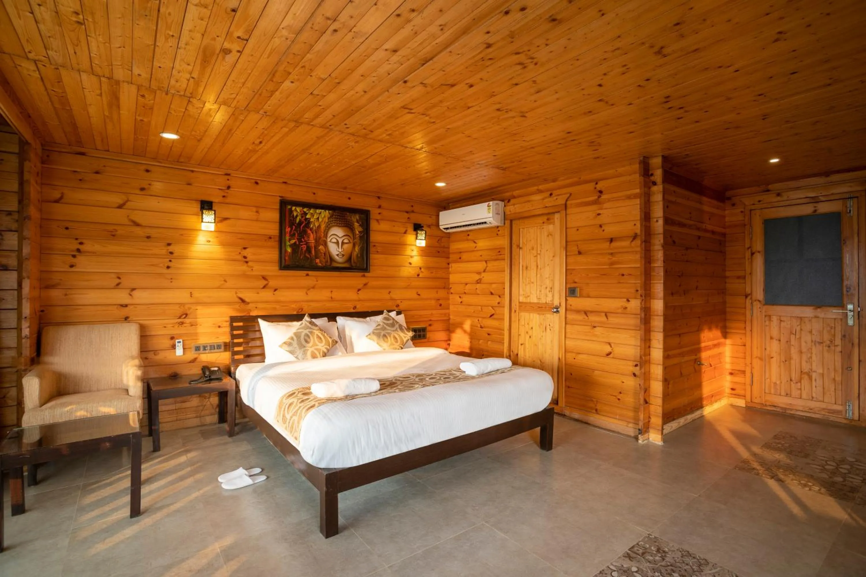 Bed in Stone Wood Riverfront Resort, Siolim