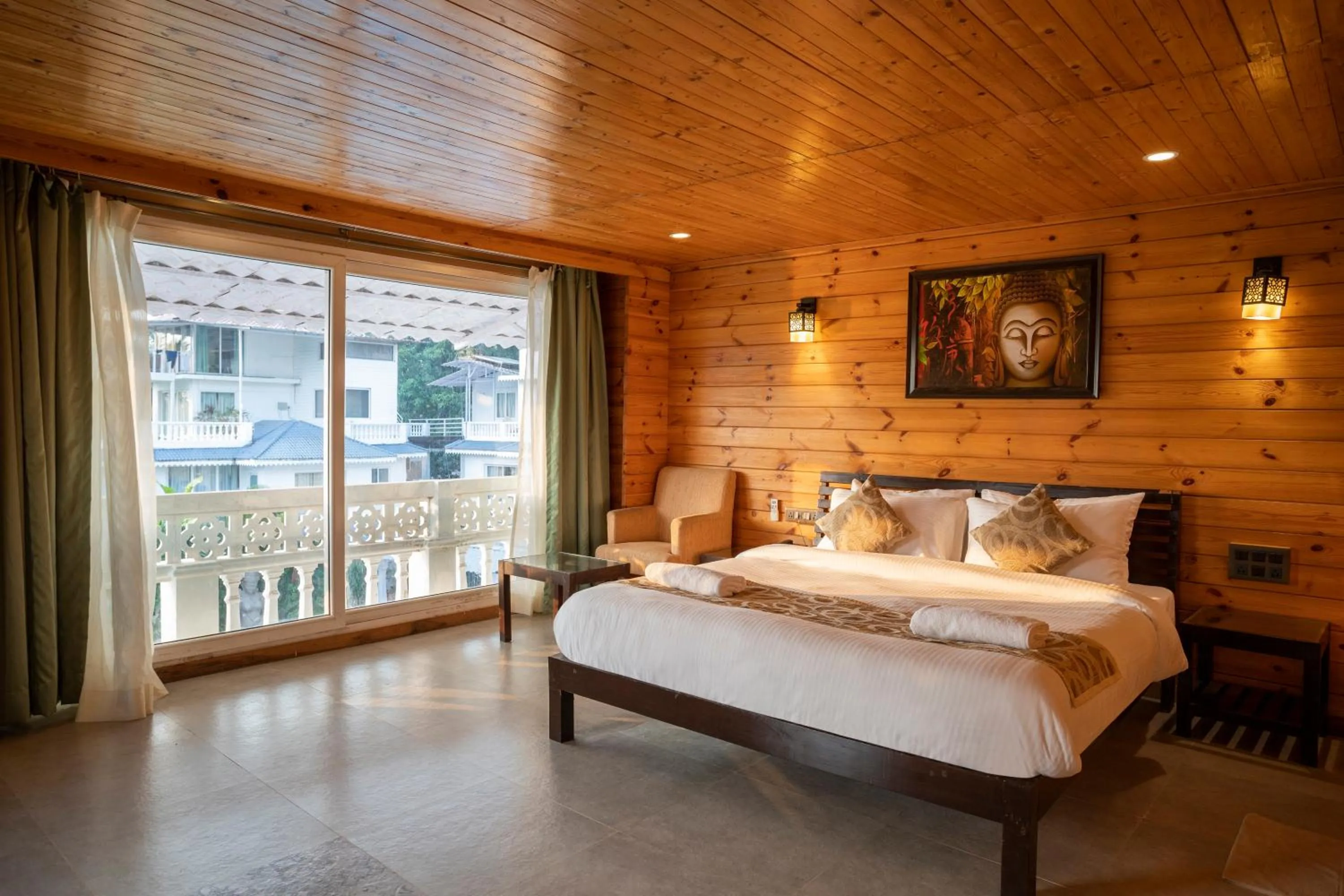 Bed in Stone Wood Riverfront Resort, Siolim