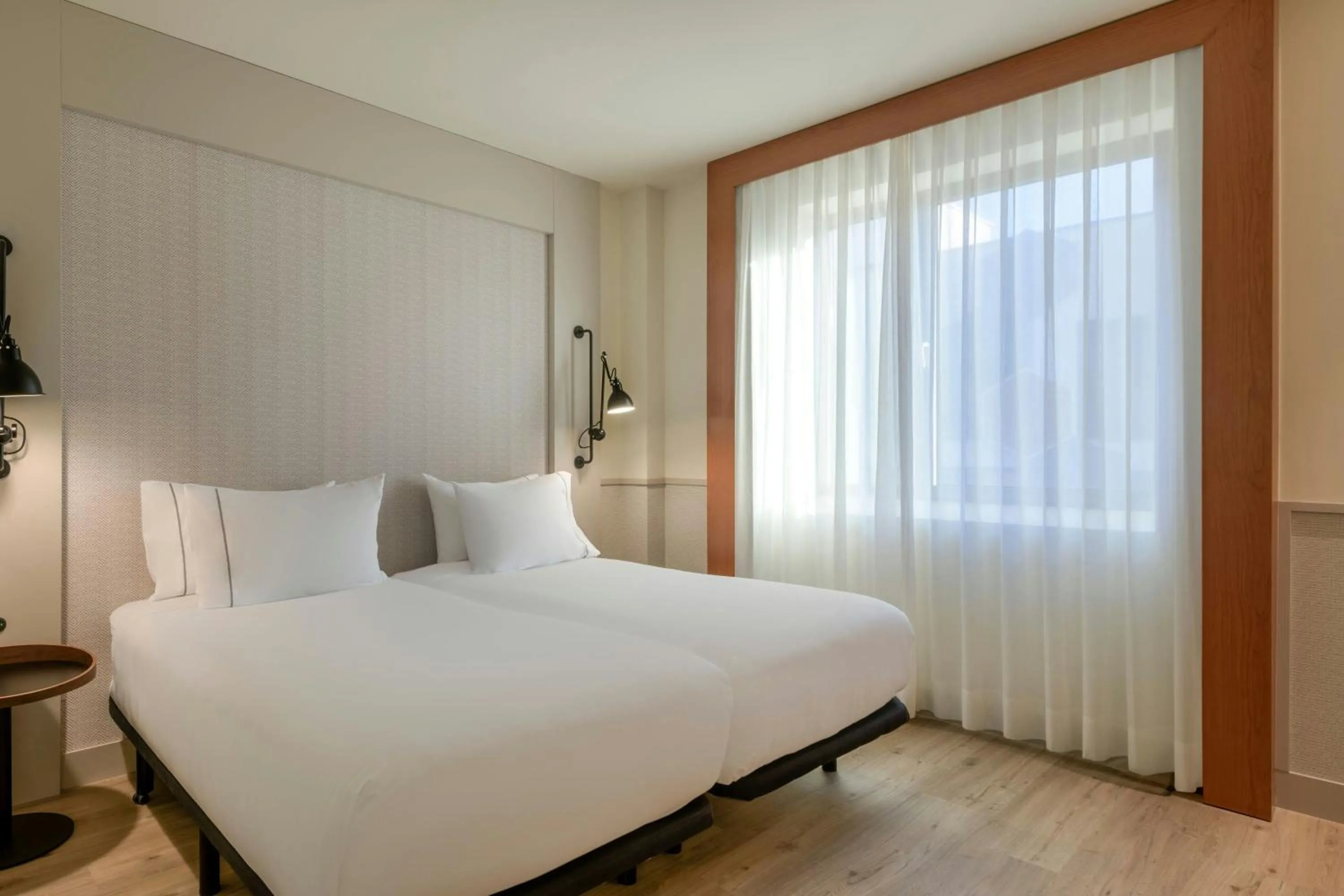 Photo of the whole room, Bed in AC Hotel Los Vascos by Marriott