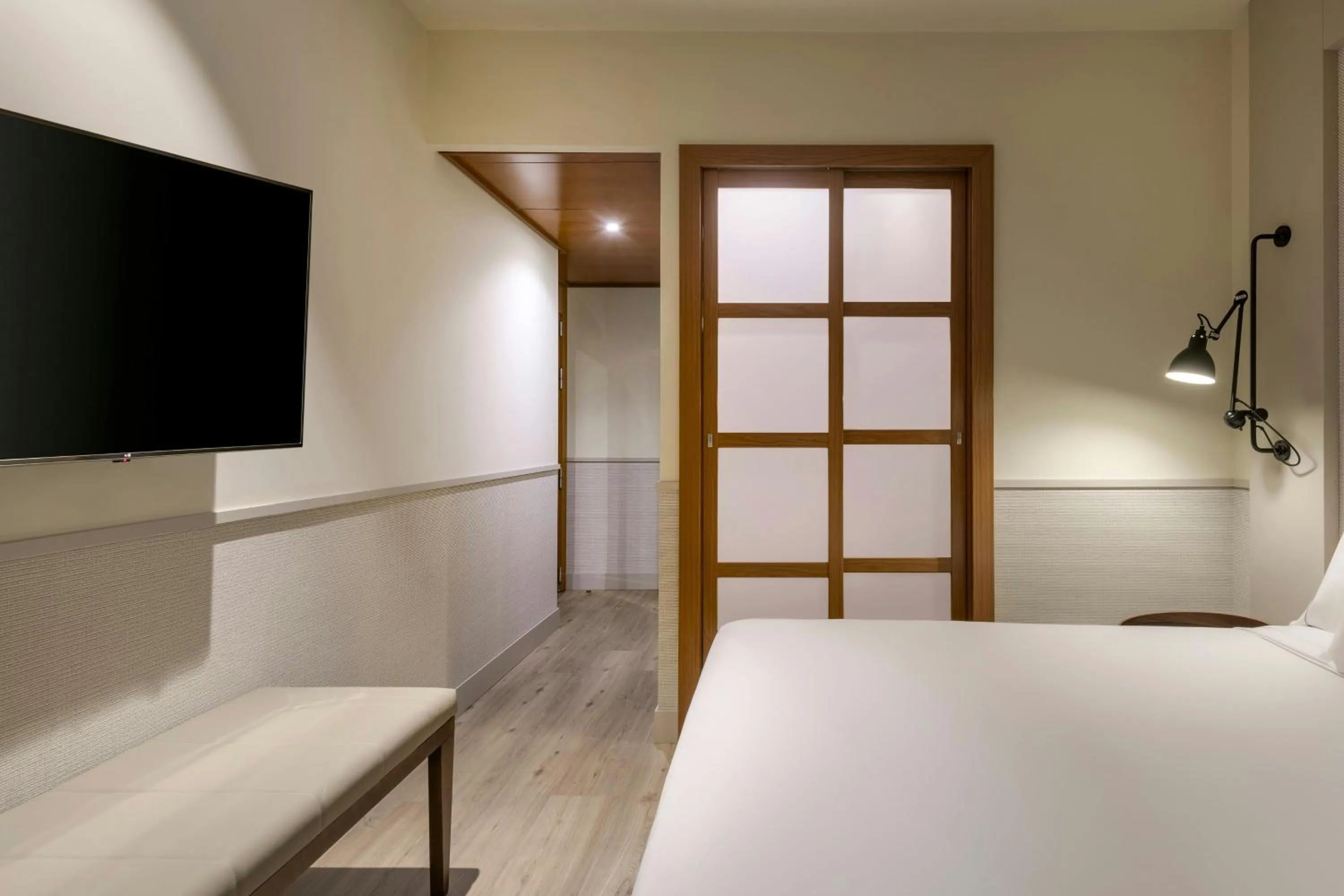 Photo of the whole room, Bed in AC Hotel Los Vascos by Marriott