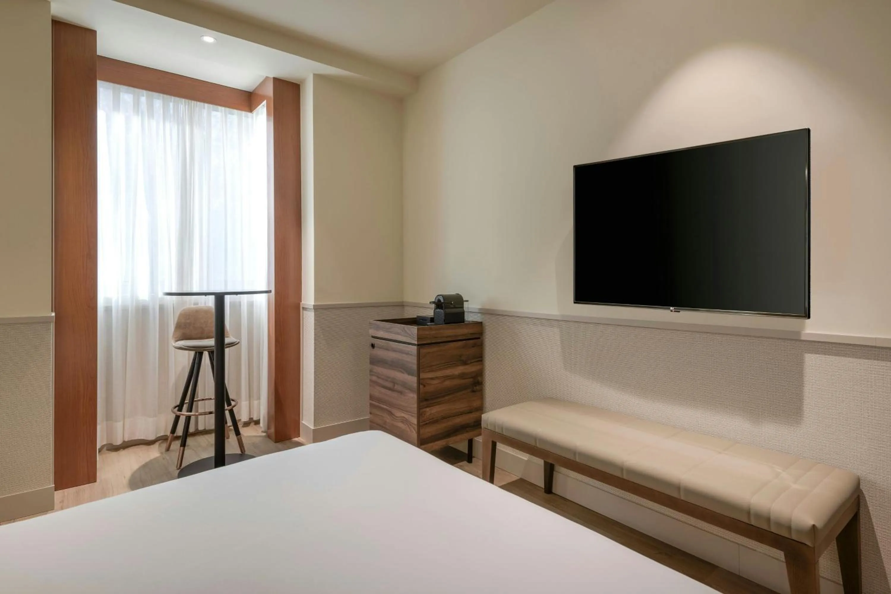 Photo of the whole room, Bed in AC Hotel Los Vascos by Marriott