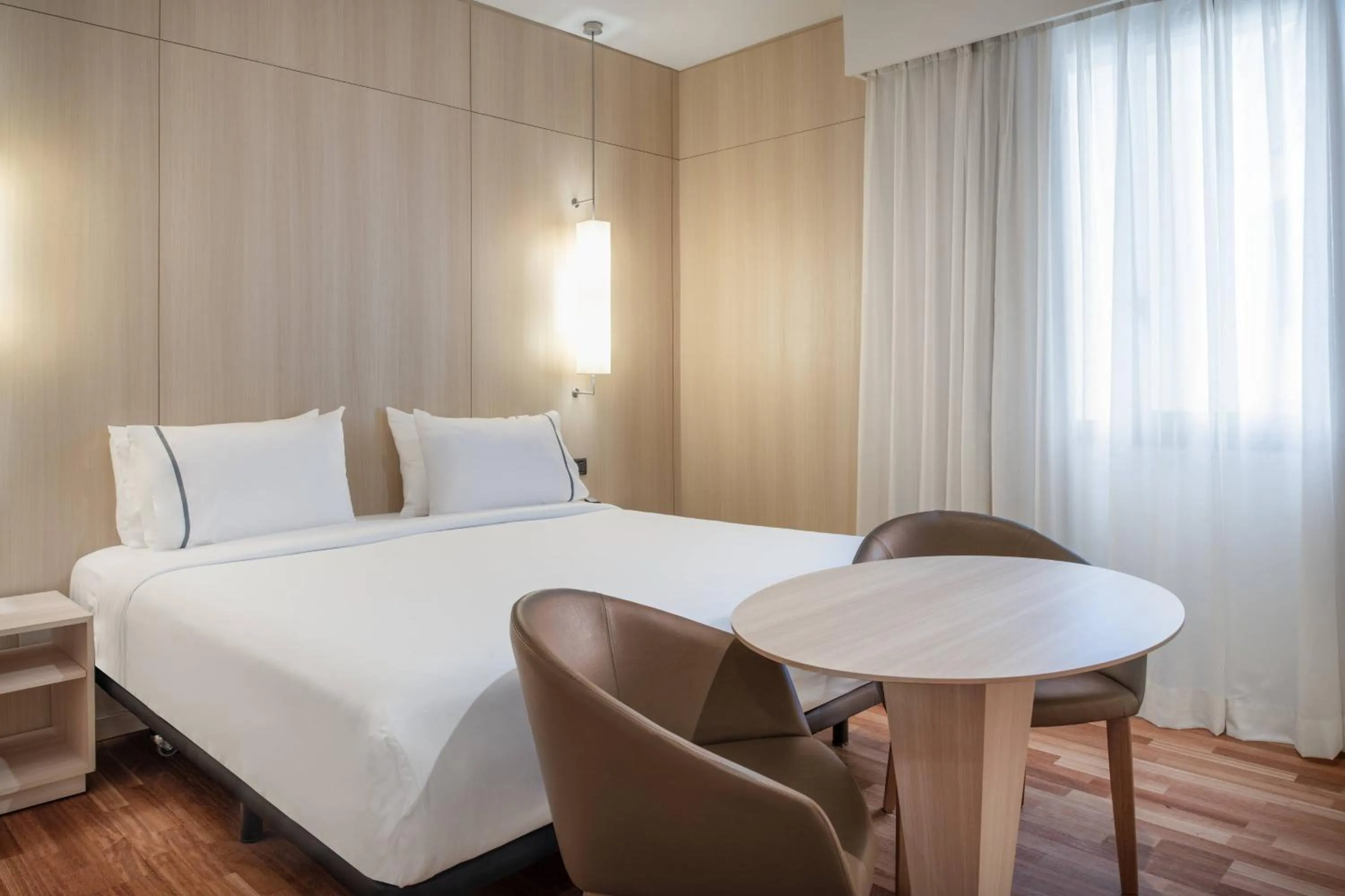 Photo of the whole room, Bed in AC Hotel Málaga Palacio by Marriott