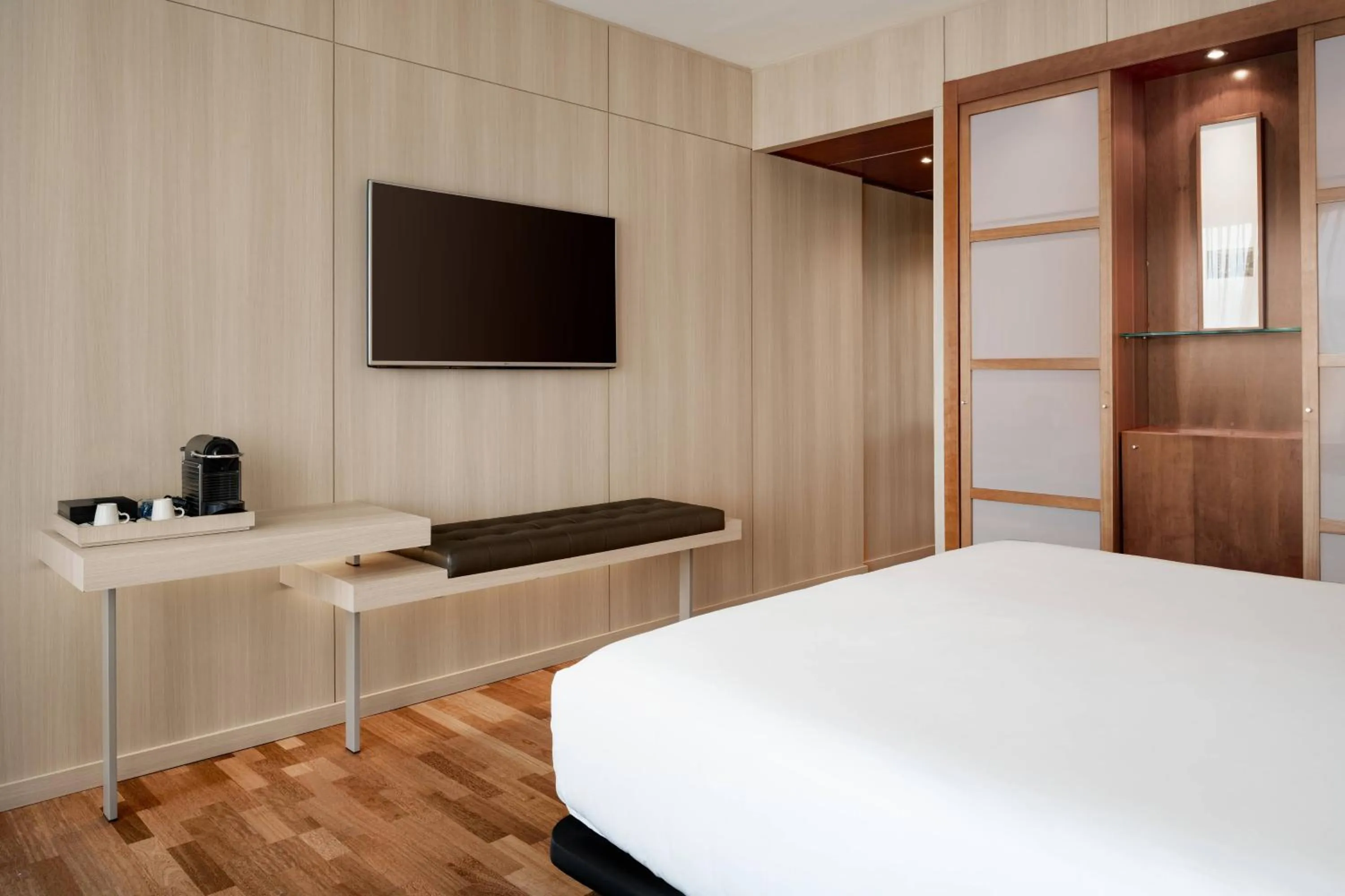 Photo of the whole room, Bed in AC Hotel Málaga Palacio by Marriott