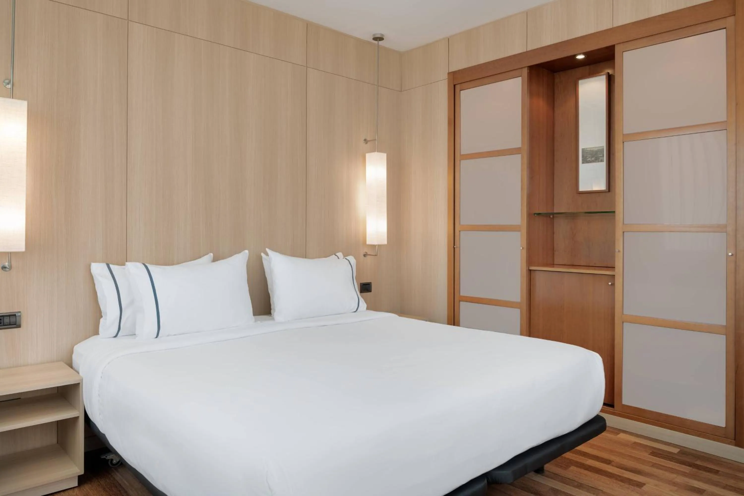 Photo of the whole room, Bed in AC Hotel Málaga Palacio by Marriott