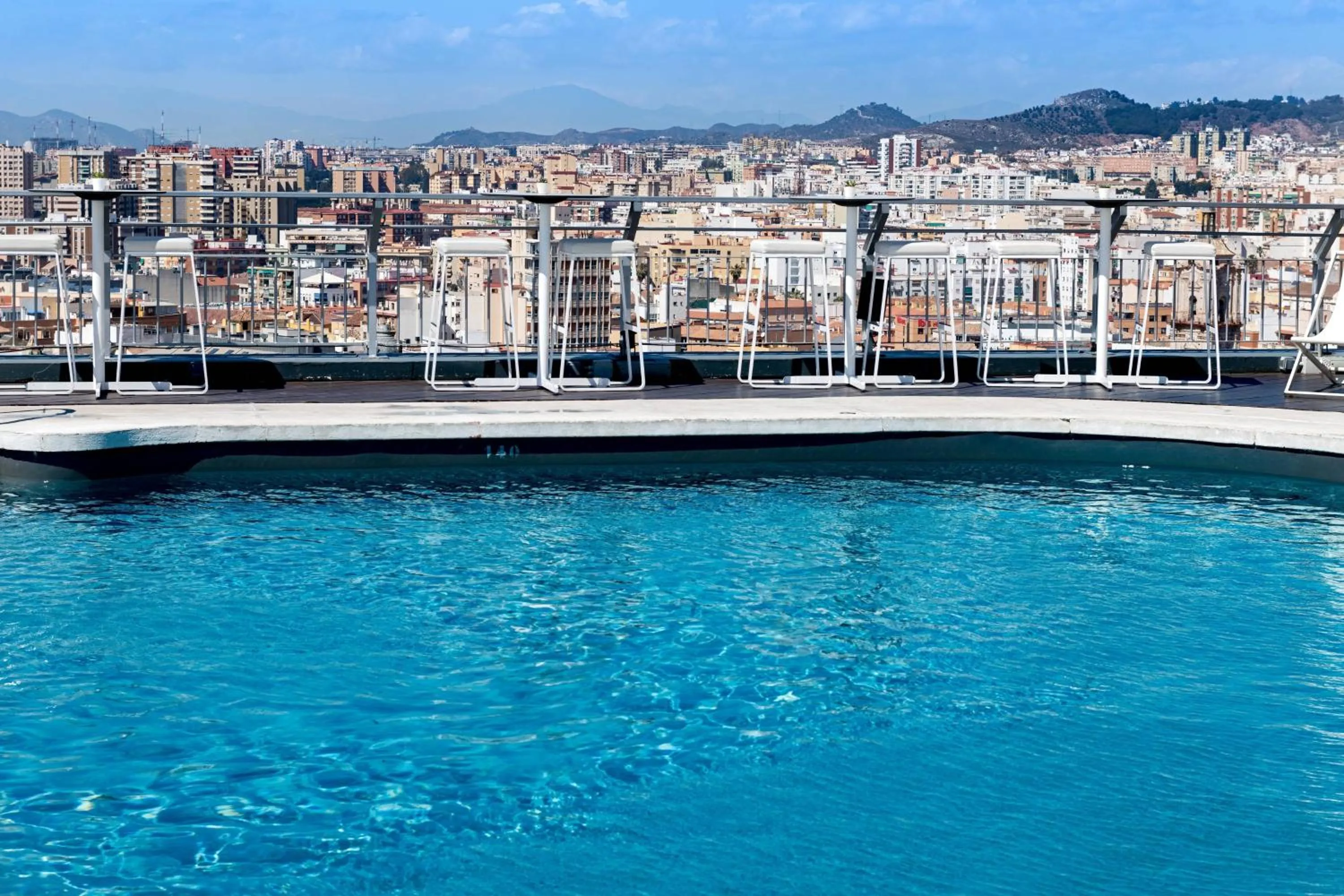 Swimming pool in AC Hotel Málaga Palacio by Marriott