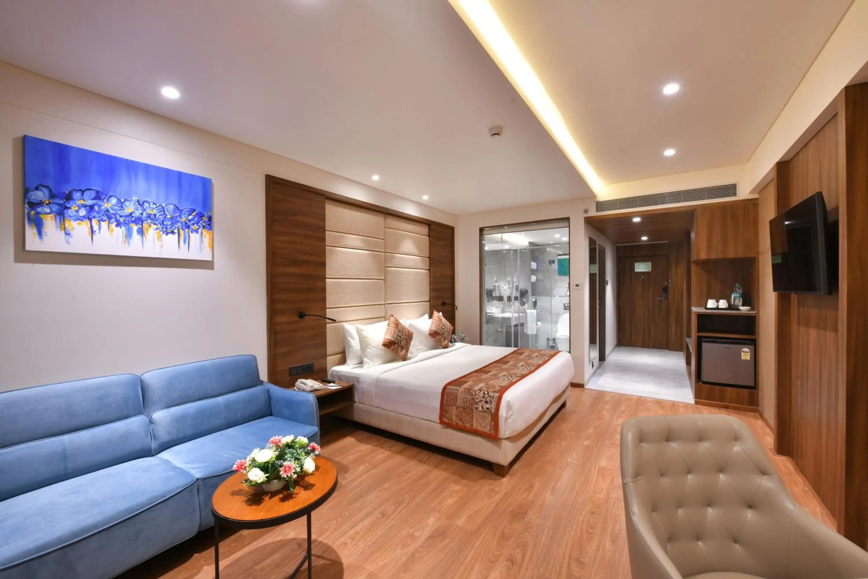 Photo of the whole room, Bed in Regenta Fairlark Vadodara