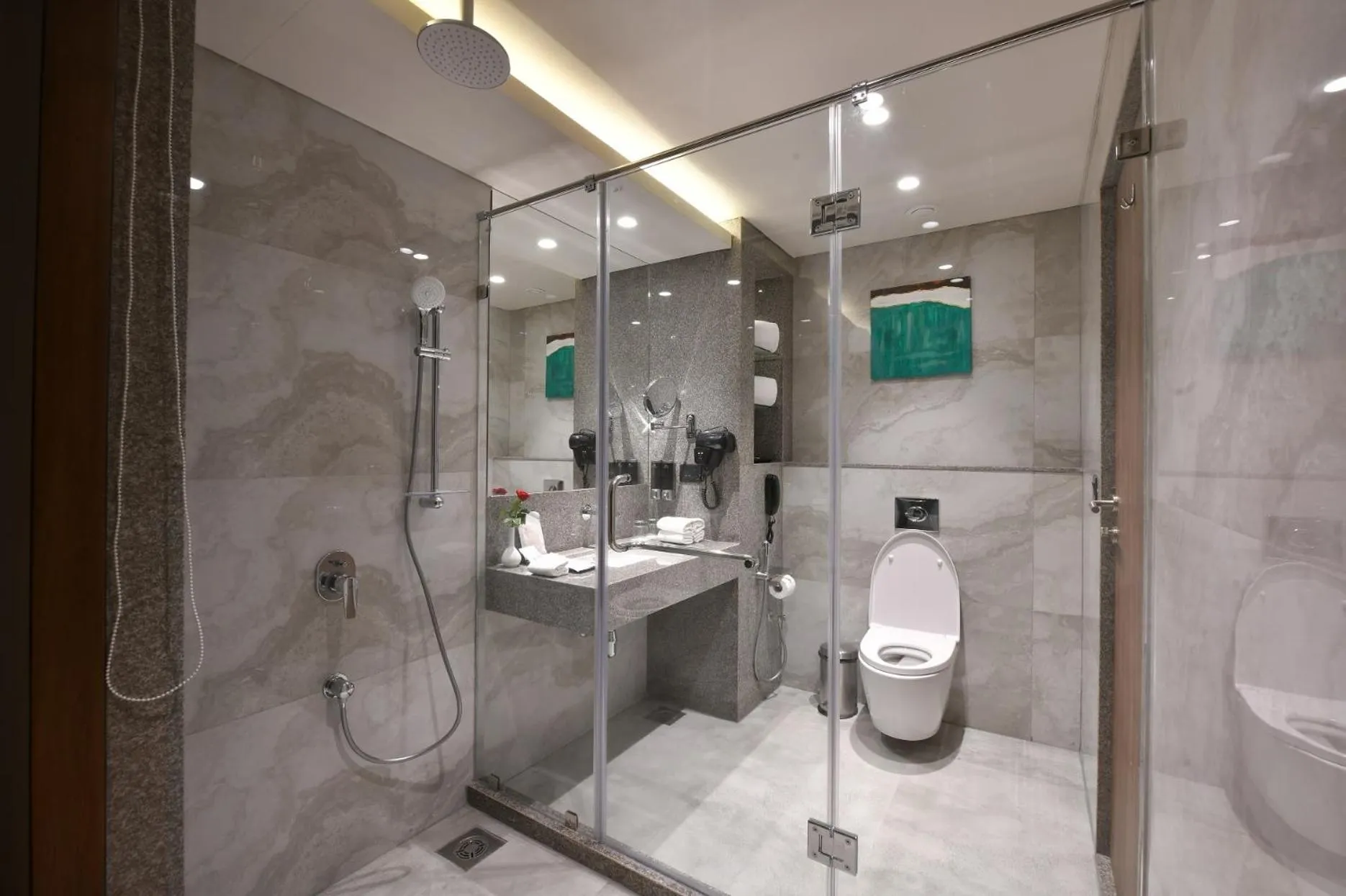 Bathroom in Regenta Fairlark Vadodara
