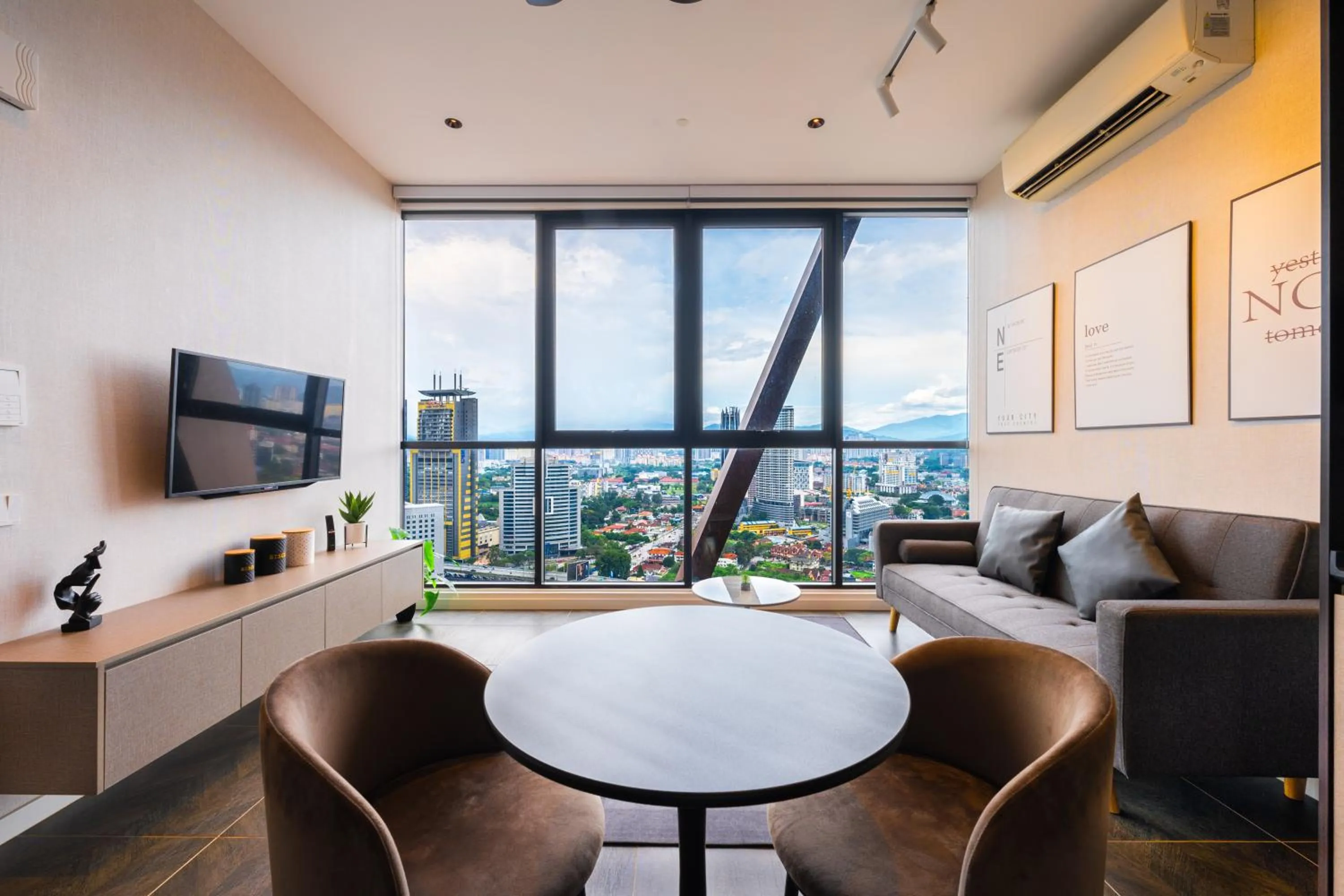 Living room in Greystone Scarletz Suites