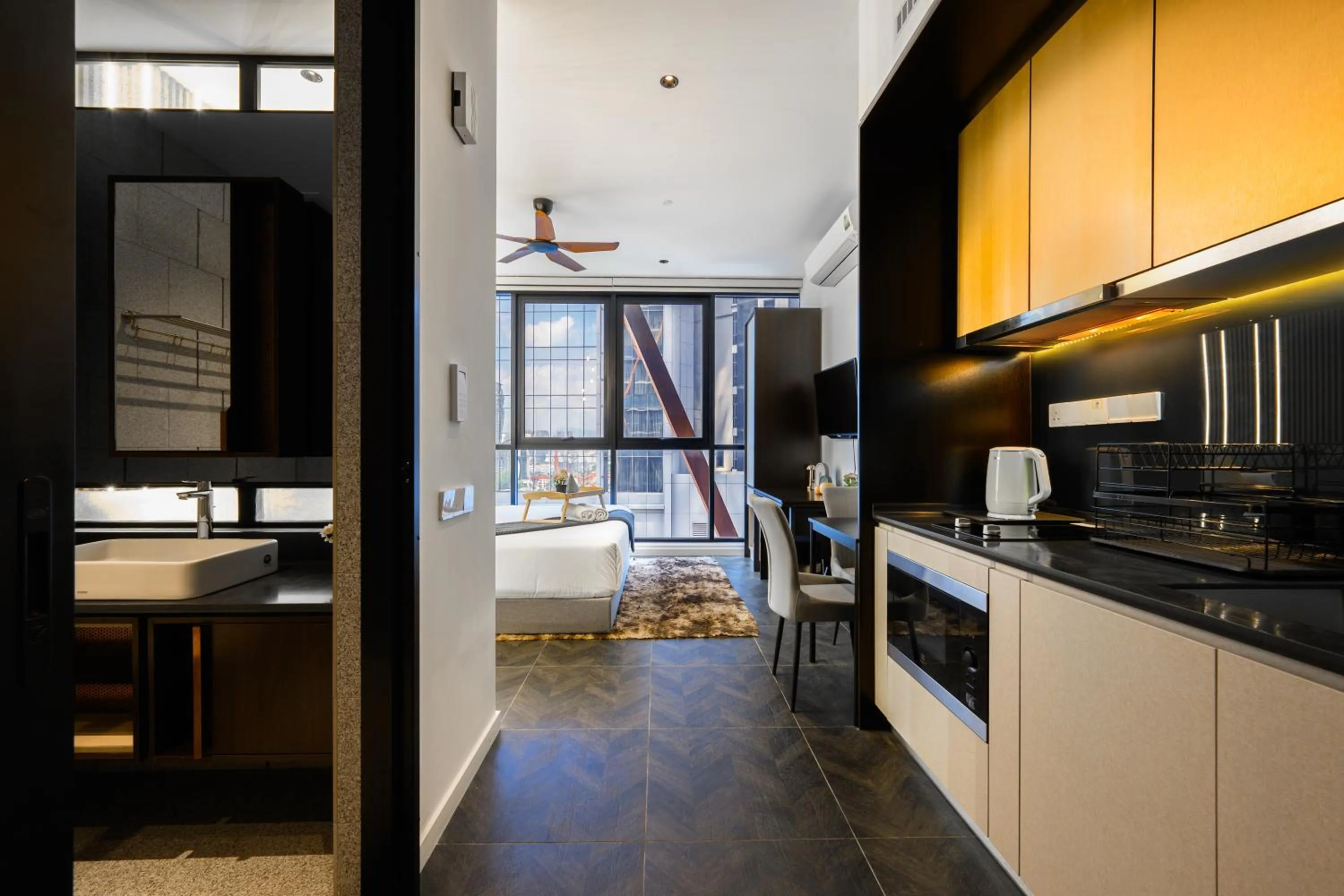 Kitchen or kitchenette in Greystone Scarletz Suites